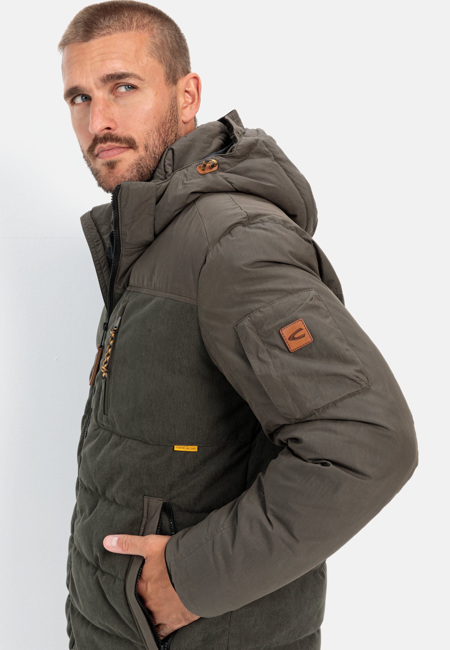 Men Quilted blouson with detachable hood Khaki worn detail close