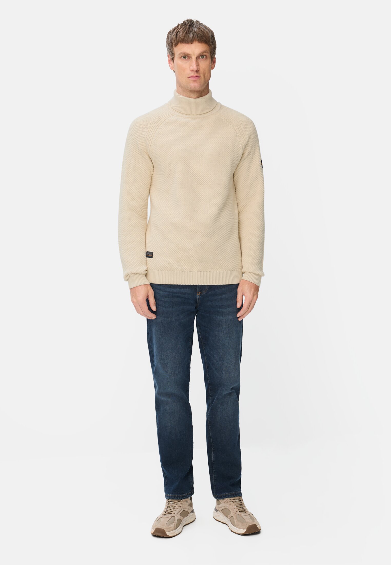 Men Turtleneck sweater with ribbed cuffs Beige worn front full body