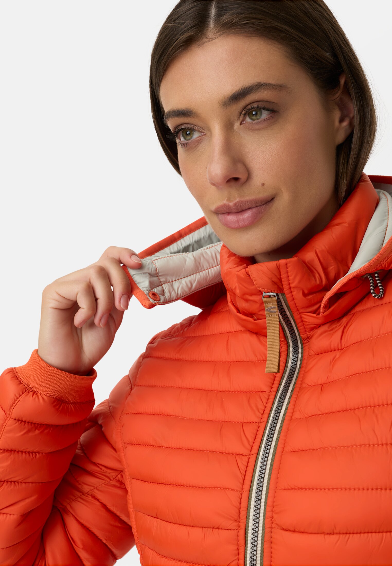 Women Windproof jacket with side knit insert Orange worn detail close