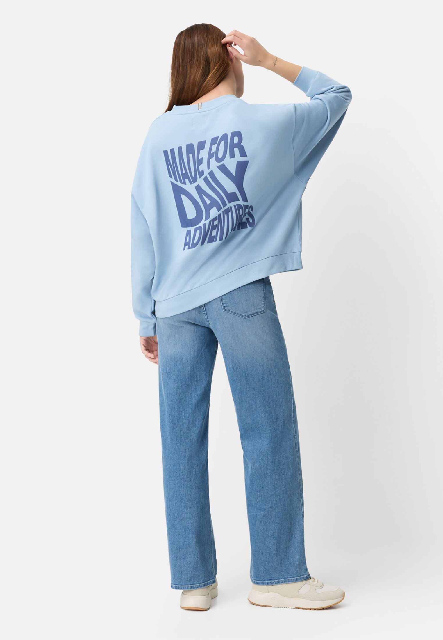 Women Sweatshirt with back print Light Blue worn front full body