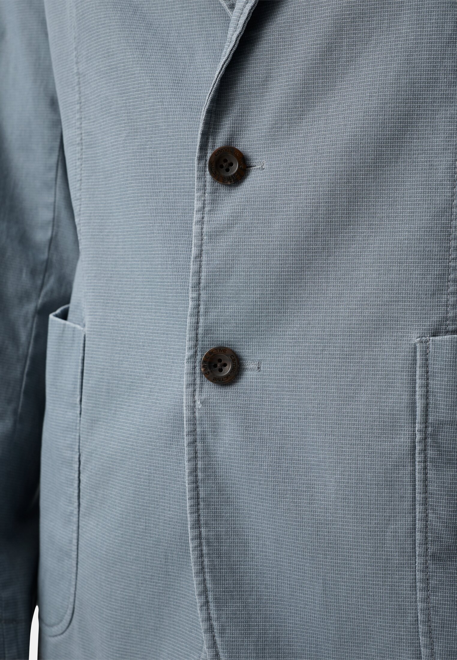 Heren Elastisch colbert met veiligheidszak Stormblauw gedragen detail dichtbij