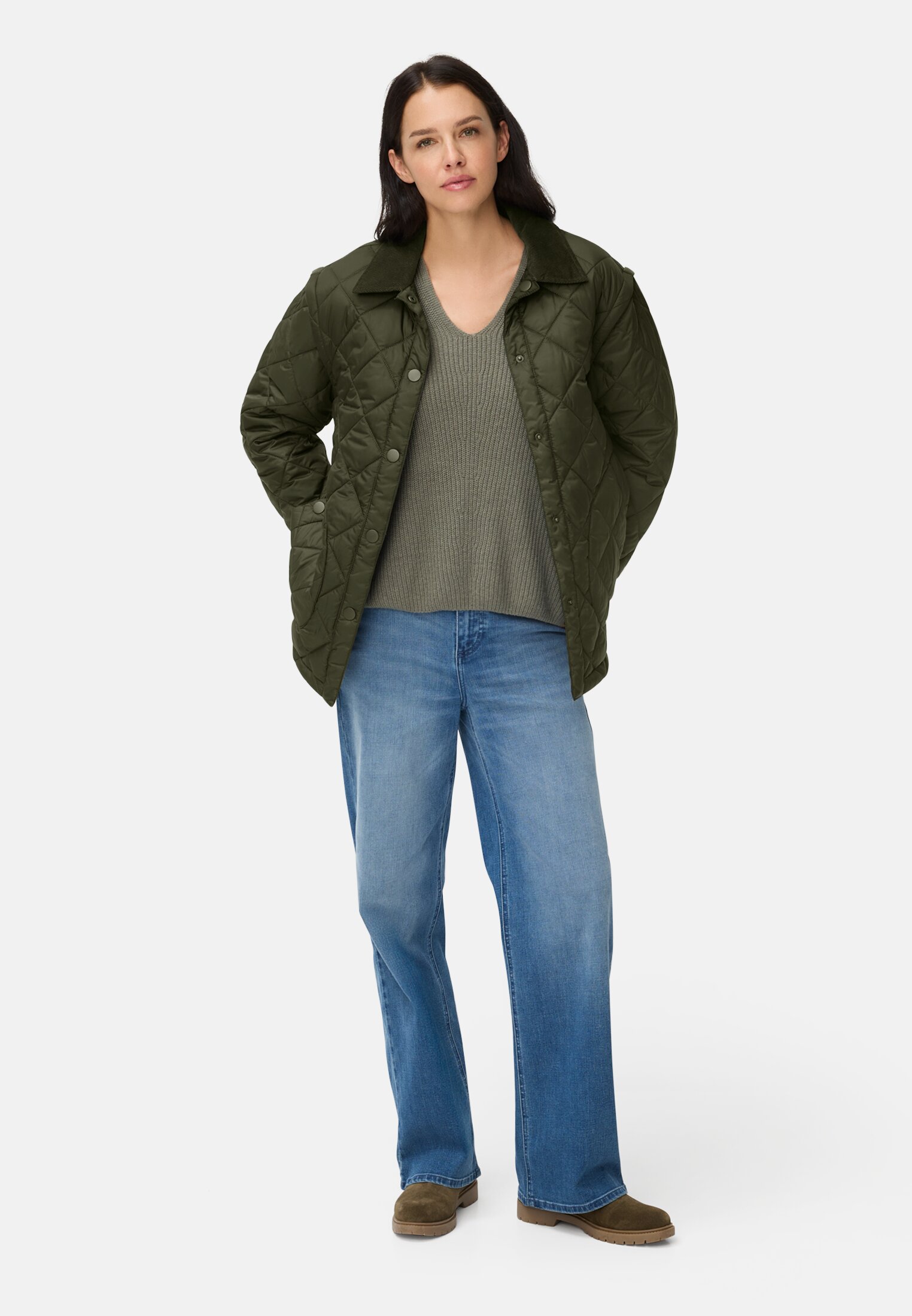 Women Quilted jacket with removable sleeves Forest Green worn front full body