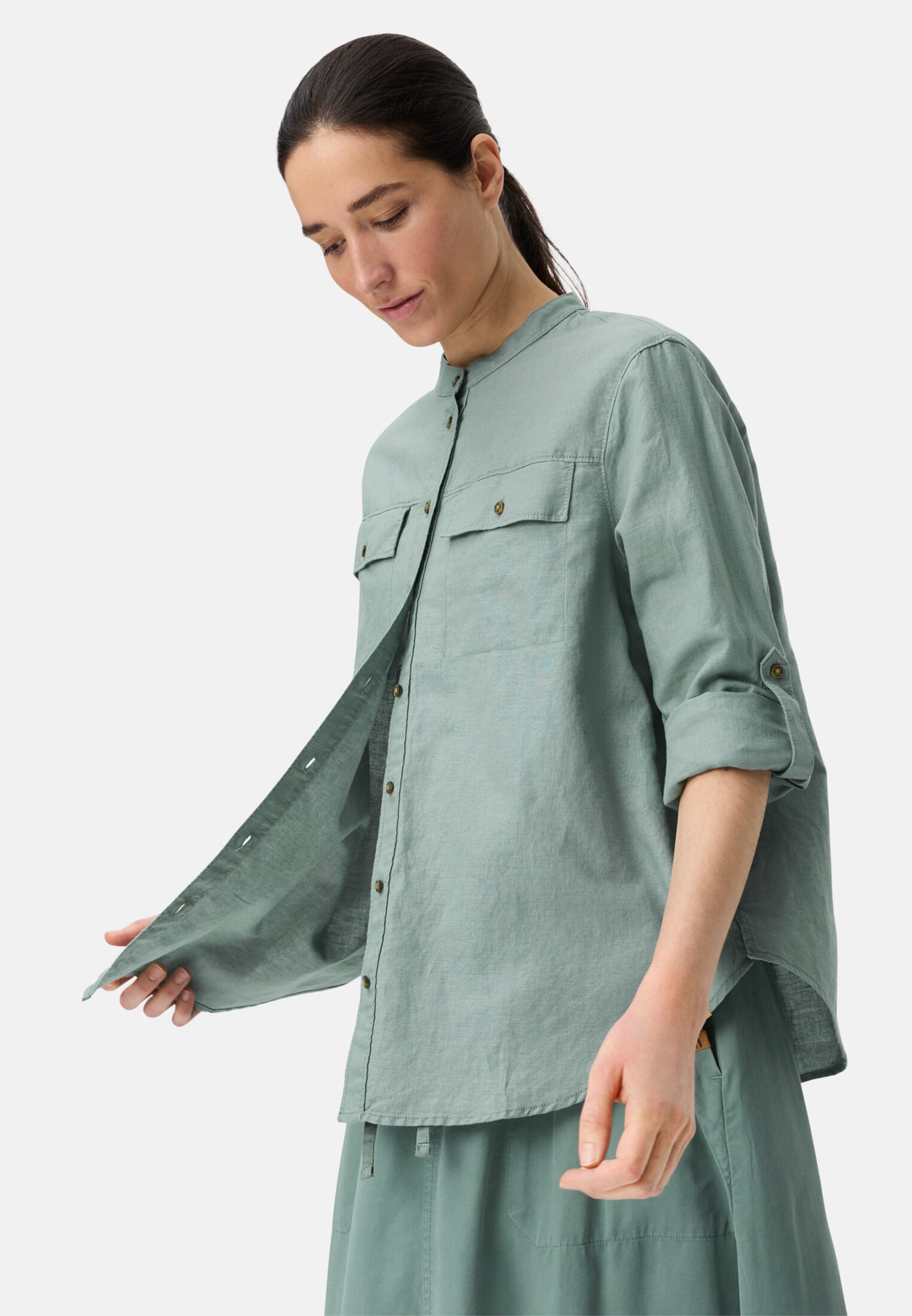 Women Blouse with stand-up collar and button placket Jade Blue worn emotional