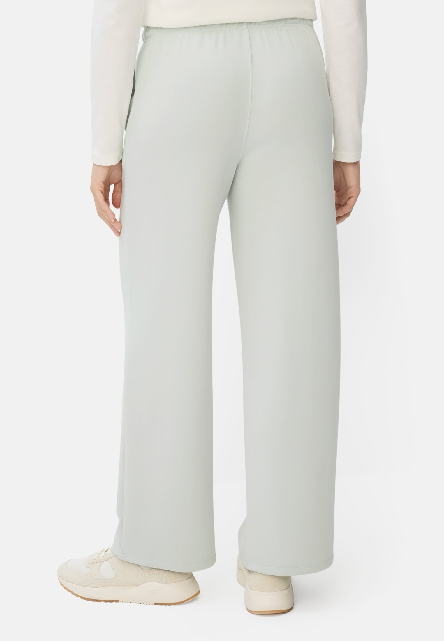 Women Casual trousers with adjustable waistband worn back