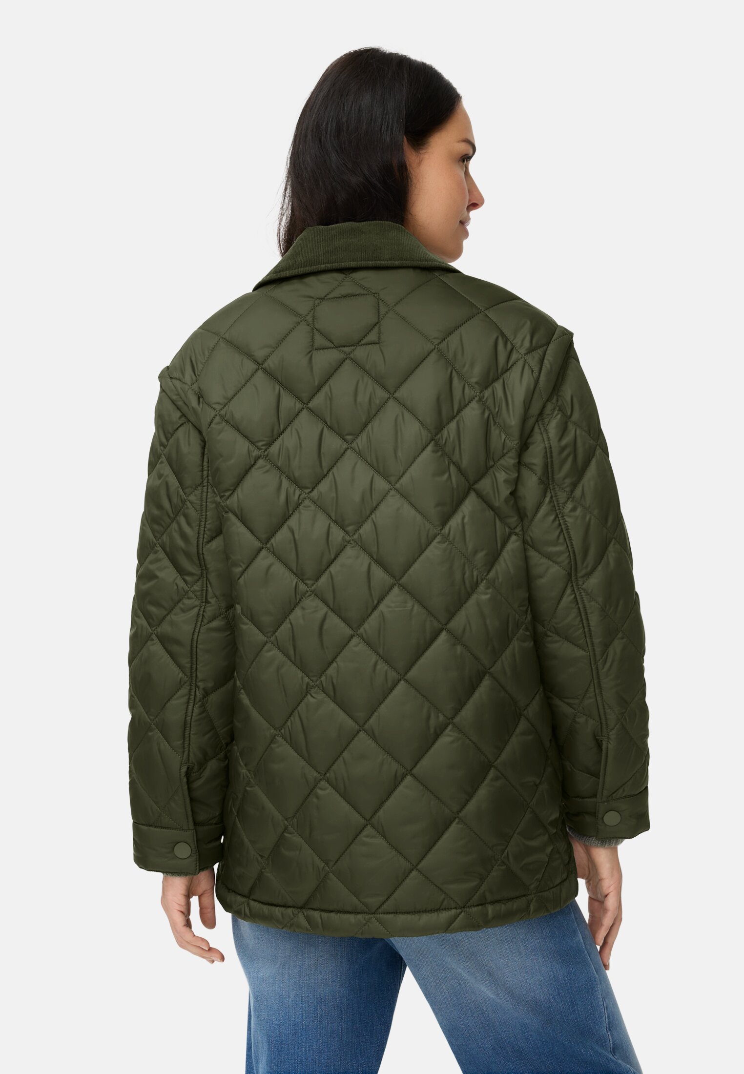 Women Quilted jacket with removable sleeves Forest Green worn back