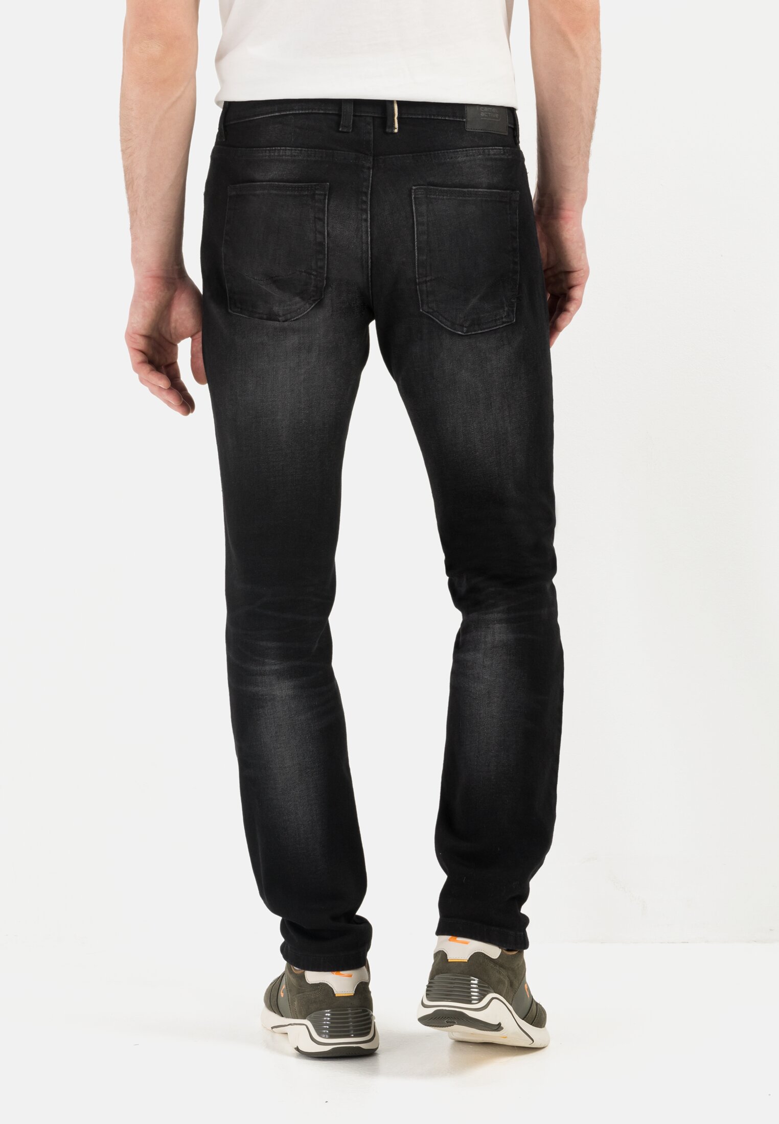Men Slim Fit fleXXXactive® 5-Pocket Jeans Dark Grey worn back