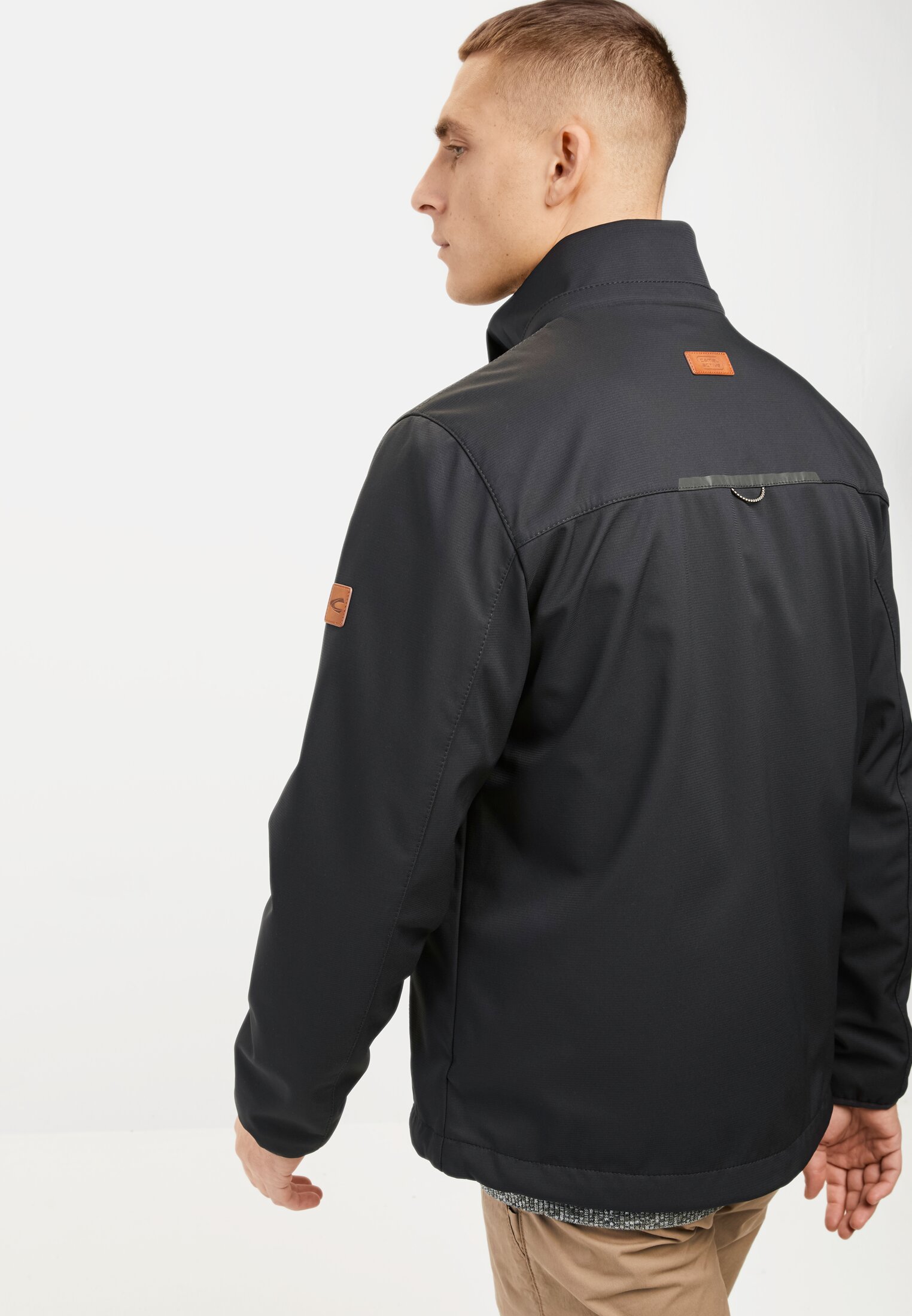 Men Softshell jacket made from recycled polyester Black worn emotional