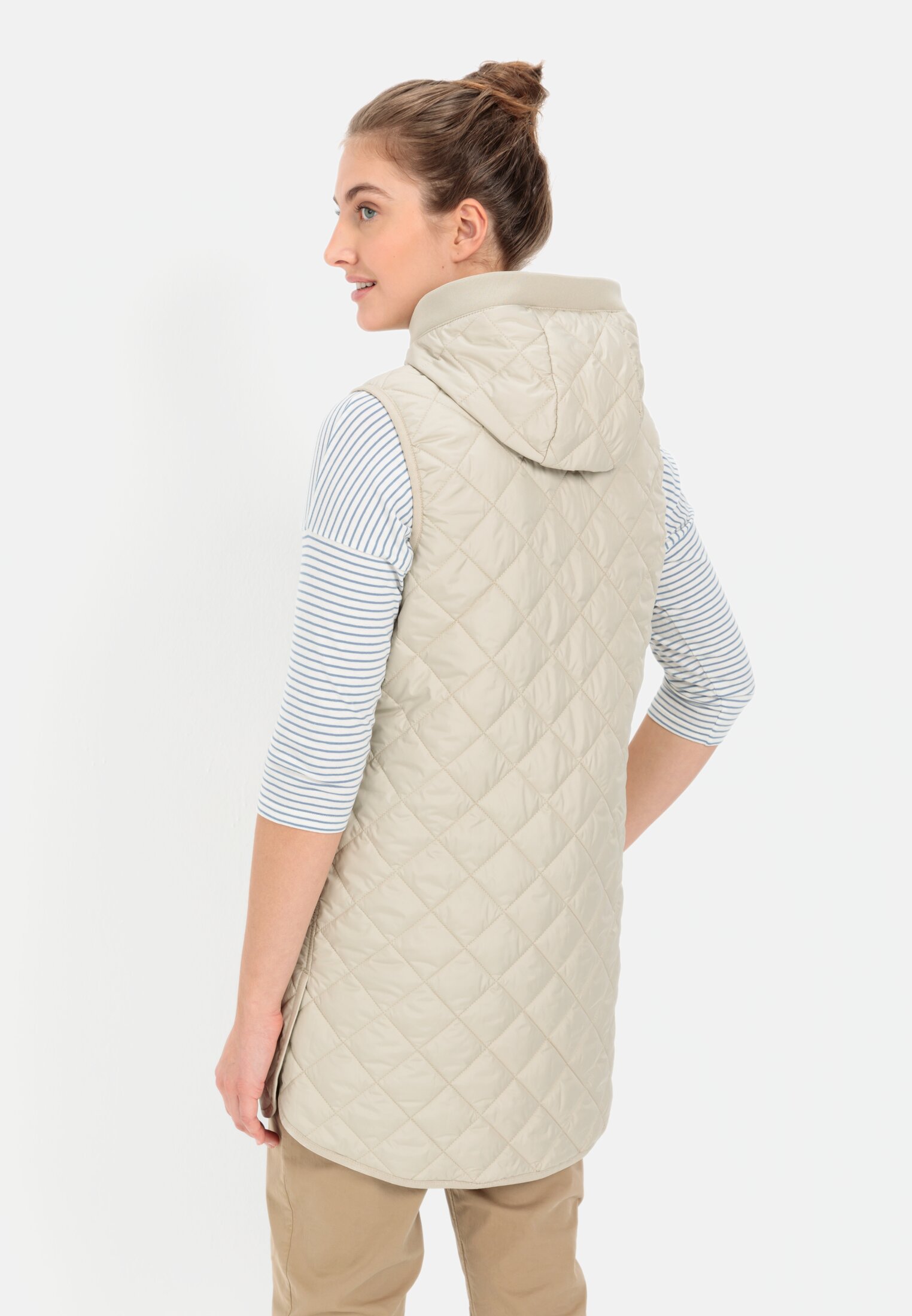 Women Long quilted vest made from recycled polyester Light Sage worn back