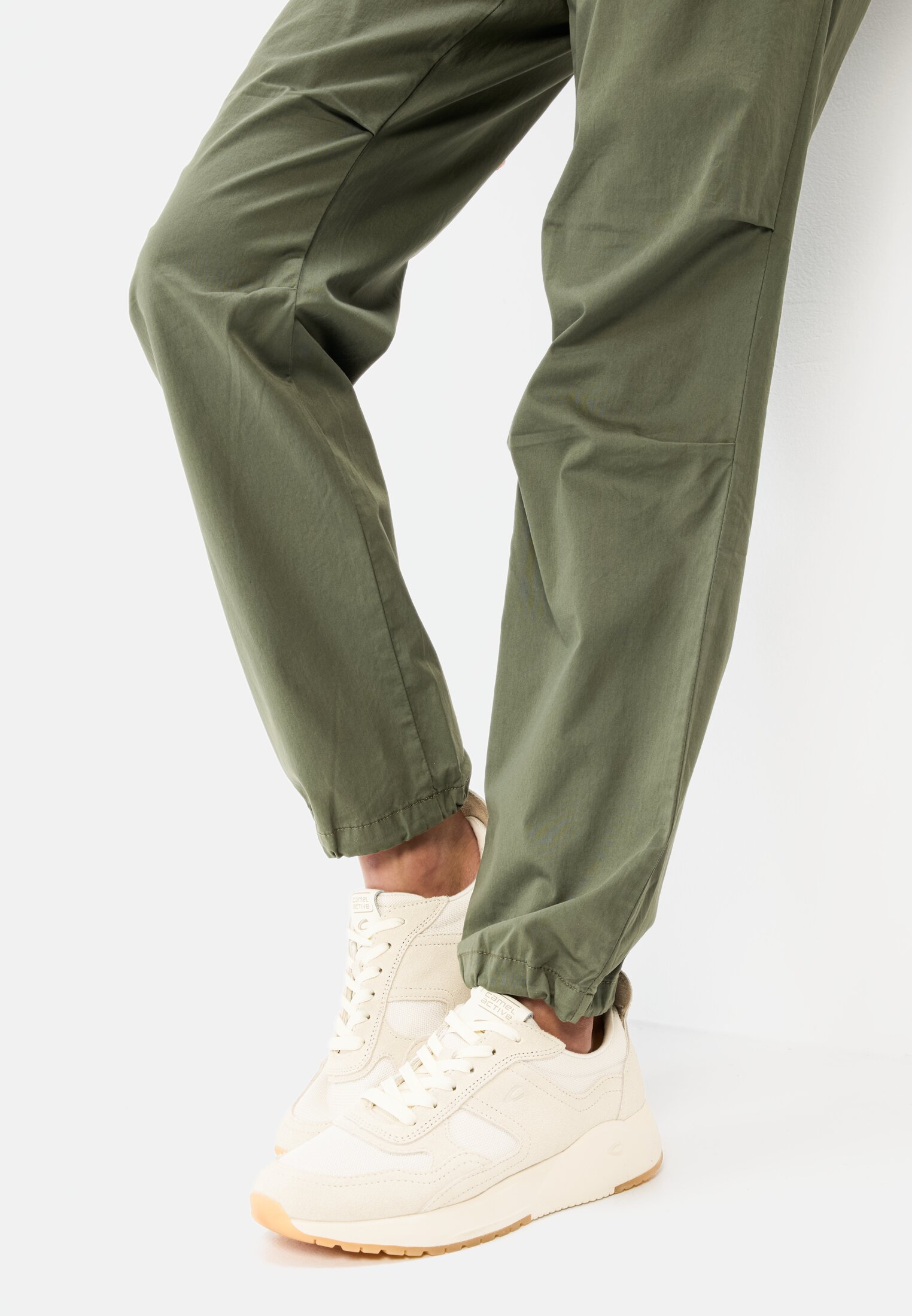 Women Casual pants made from a cotton blend Dark Green worn detail close