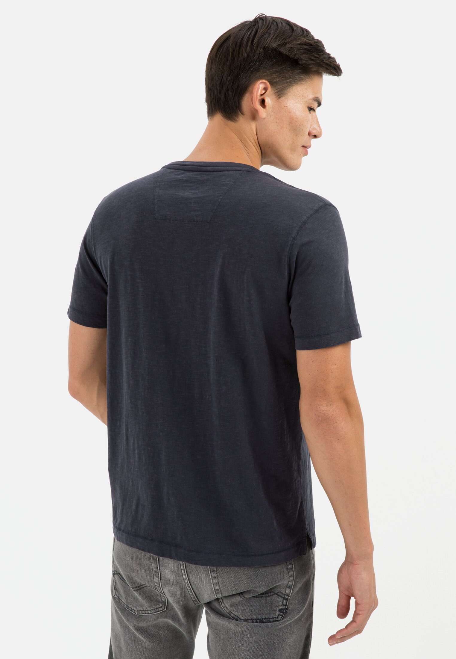 Men Henley shirt with short sleeves made of pure cotton. Dark Blue worn back