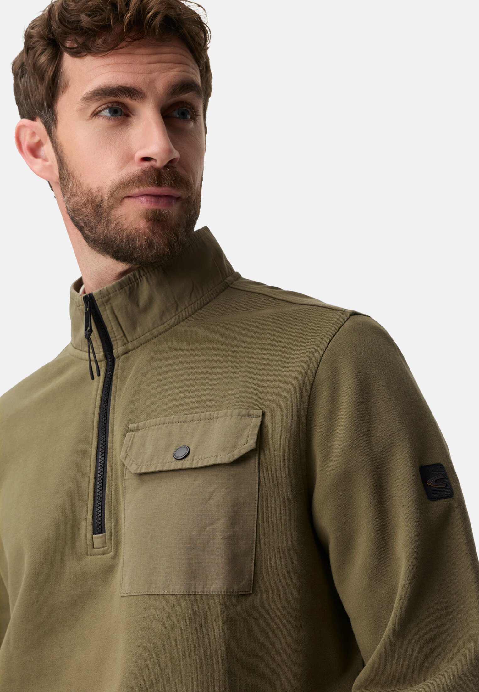 Heren Troyer met reflecterende details Olijfgroen gedragen detail dichtbij  