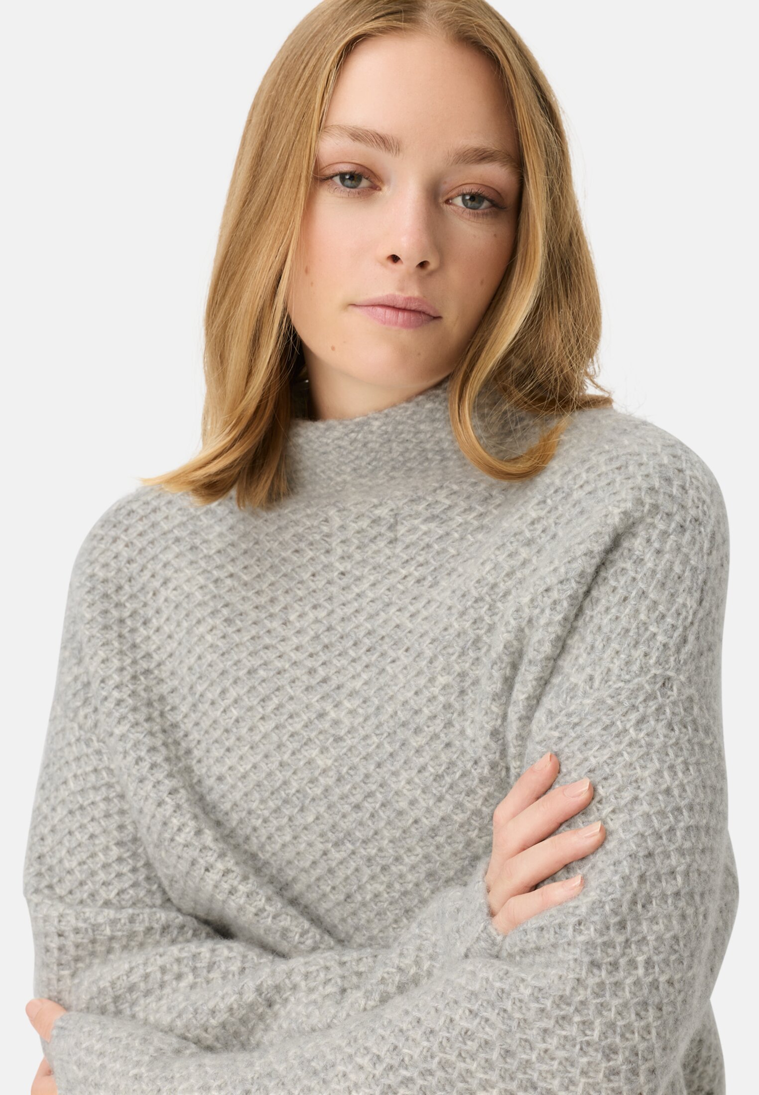 Women Knitted sweater with stand-up collar Gray worn detail close