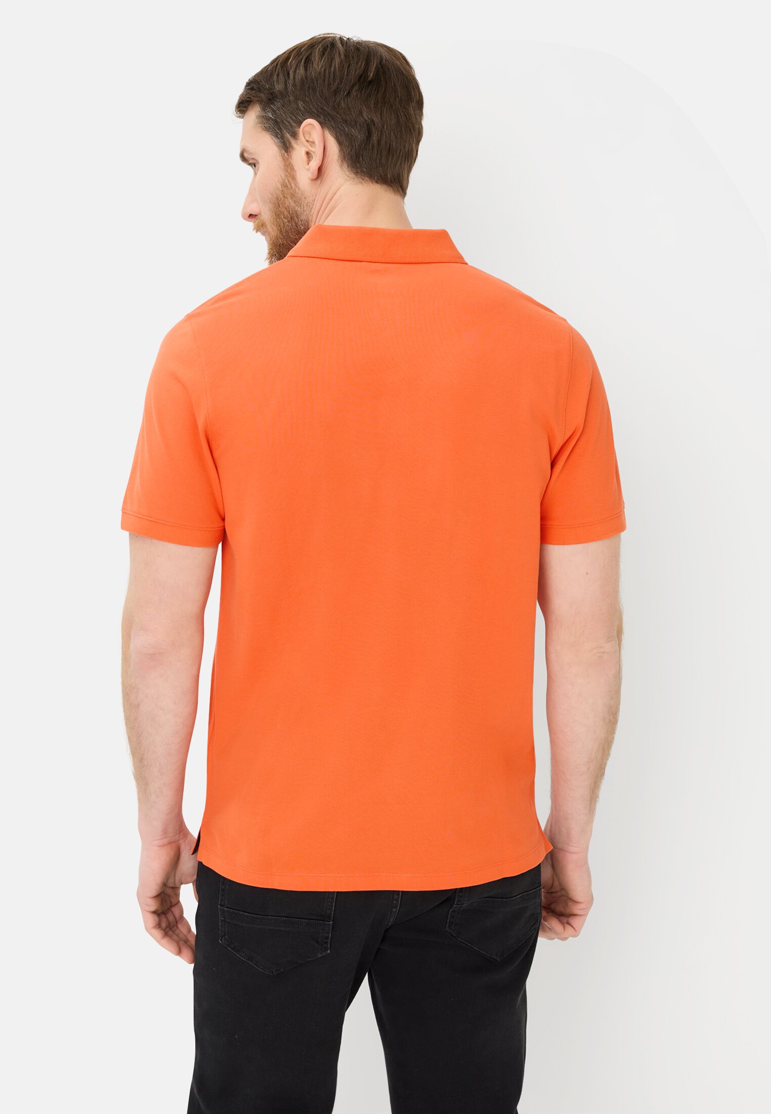 Herren Poloshirt mit Kontrastdetails Orange getragen hinten