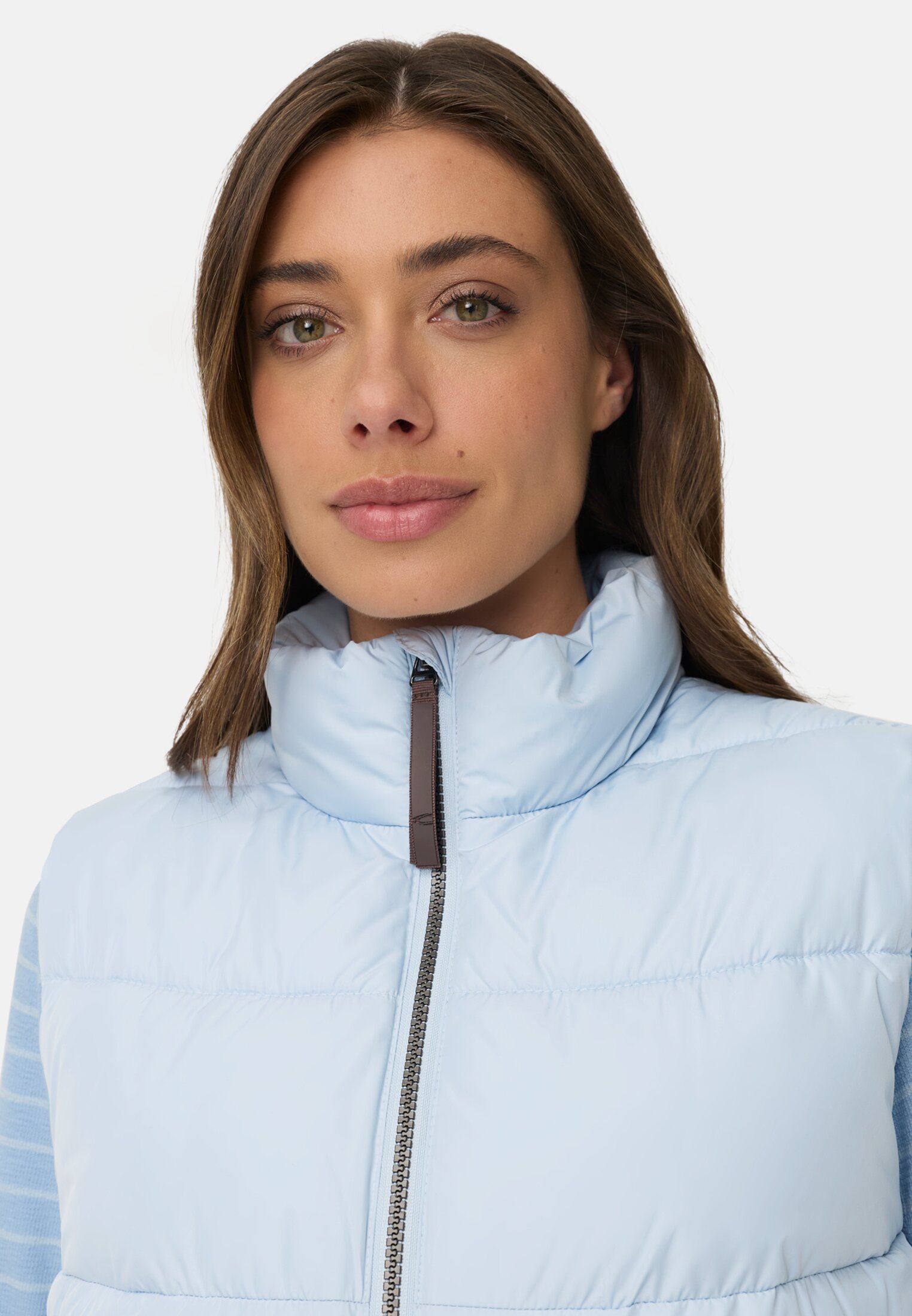 Women Windproof vest with zippered pockets Light Blue worn detail close
