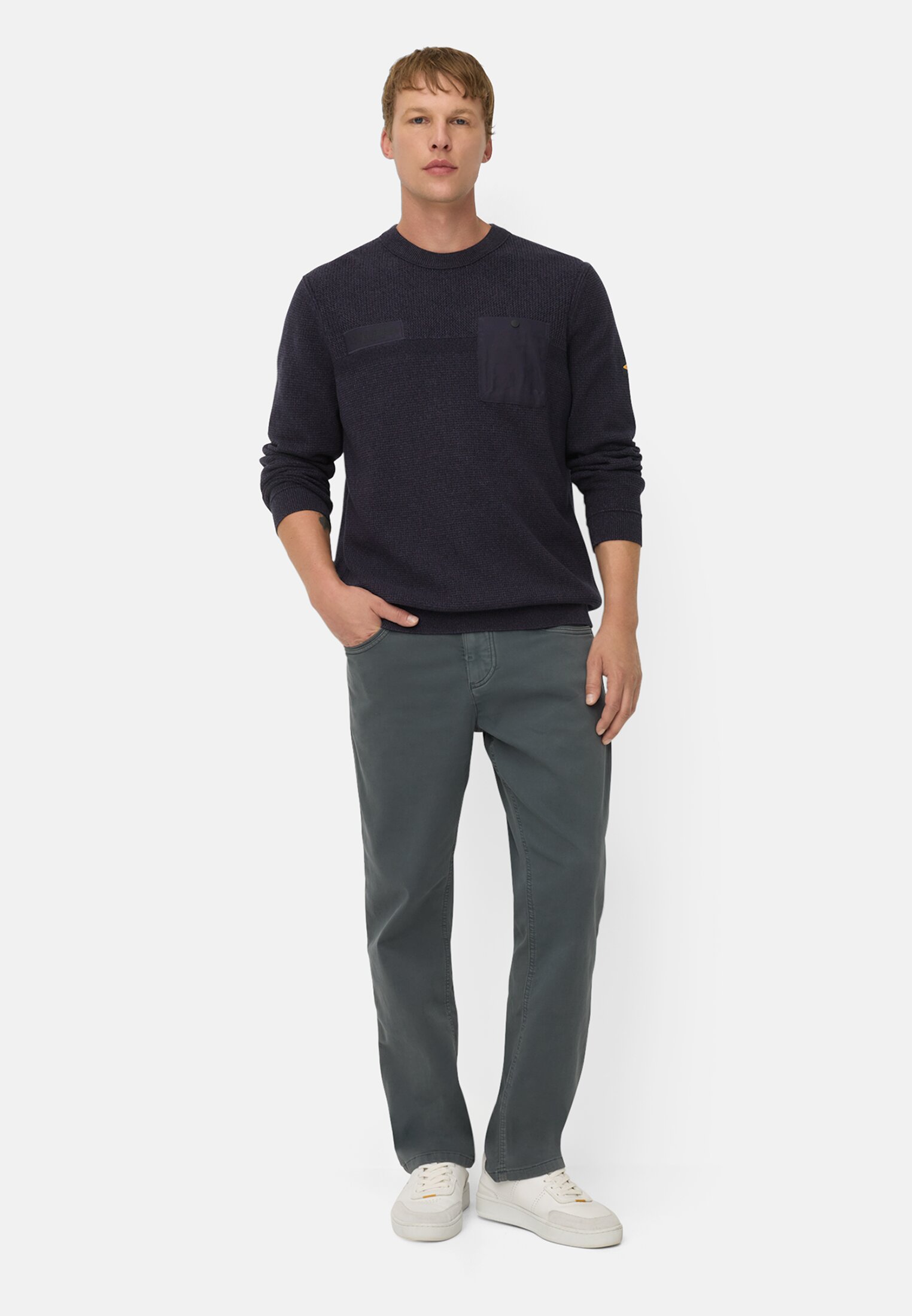 Men Knitted sweater with chest pocket Ink blue worn front full body