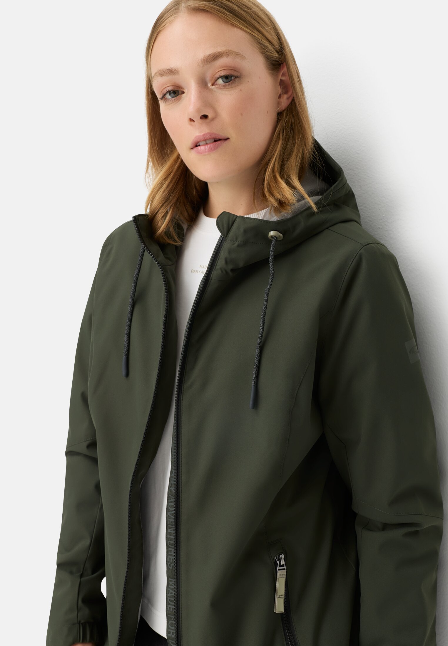 Women Functional jacket with adjustable hood Forest Green worn emotional