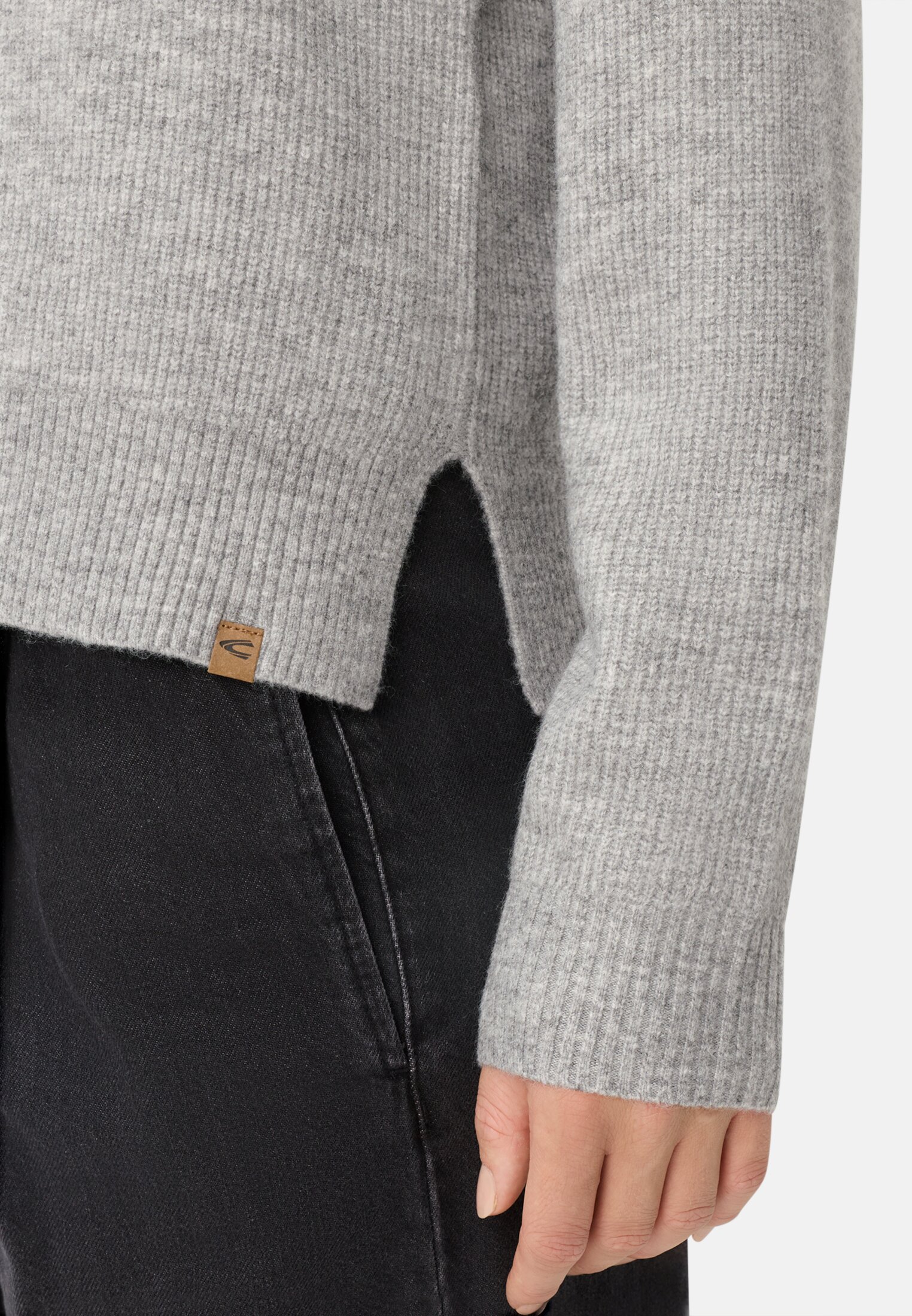 Women Knitted sweater with hood Gray worn detail close