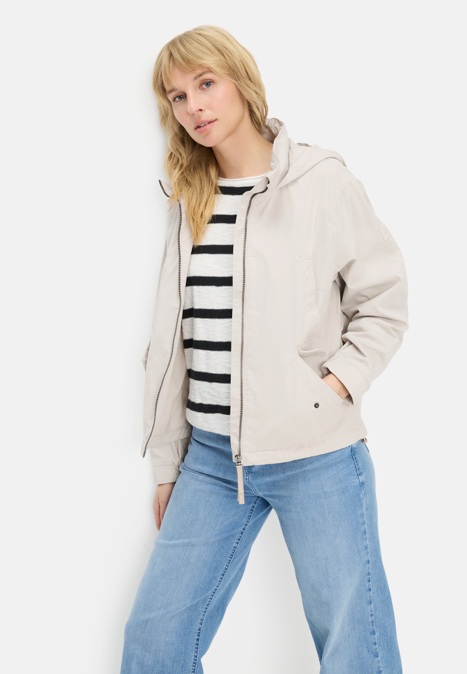 Women Jacket with roll-out hood Pearl White worn emotional