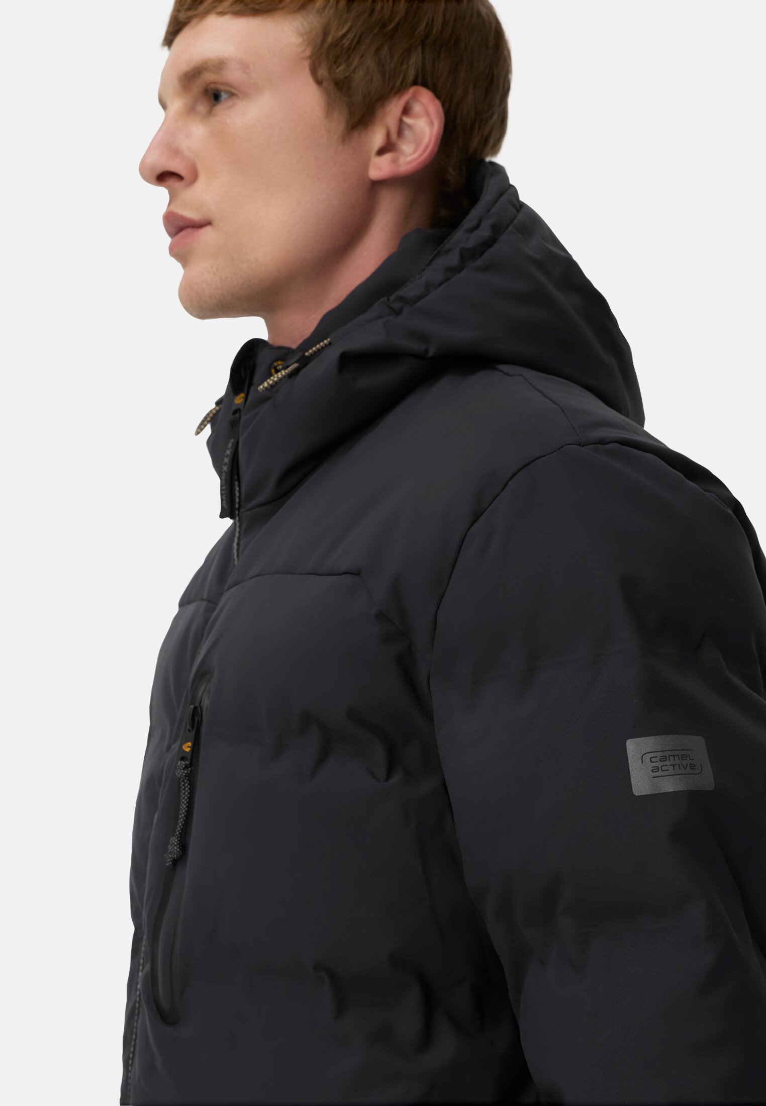 Heren teXXXactive®  Functionele jas met verstelbare zoom en capuchon Marineblauw gedragen detail dichtbij  