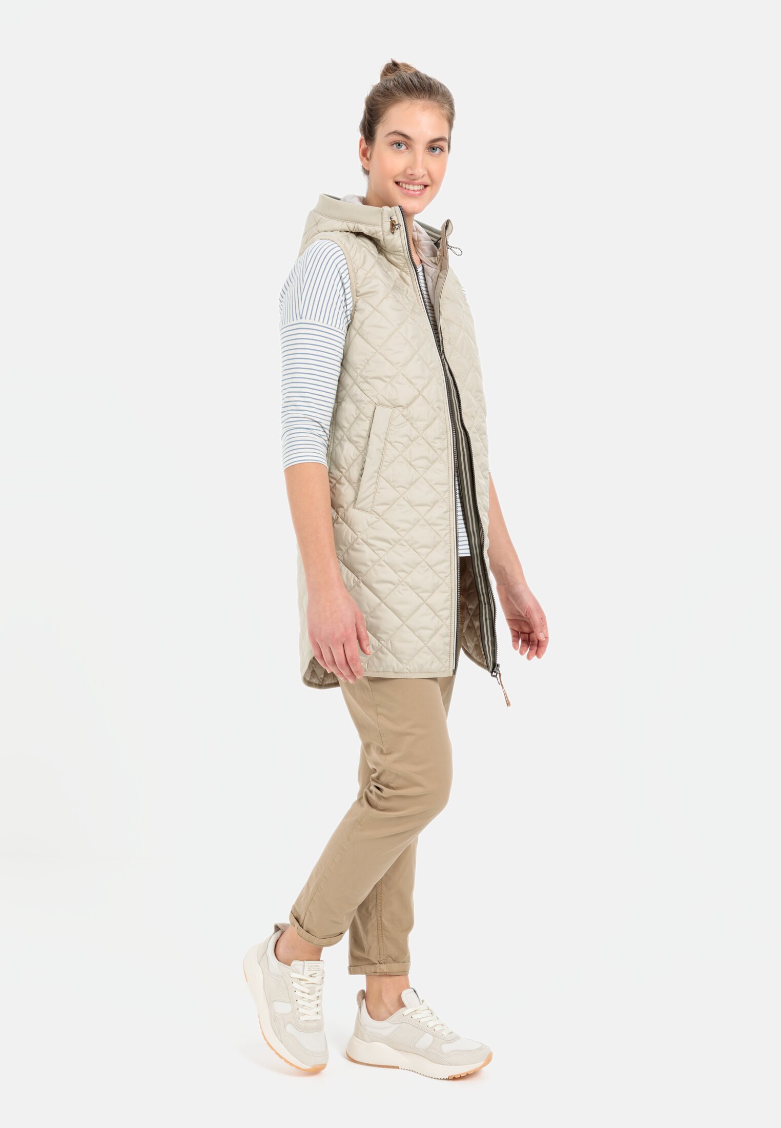 Women Long quilted vest made from recycled polyester Light Sage worn front full body