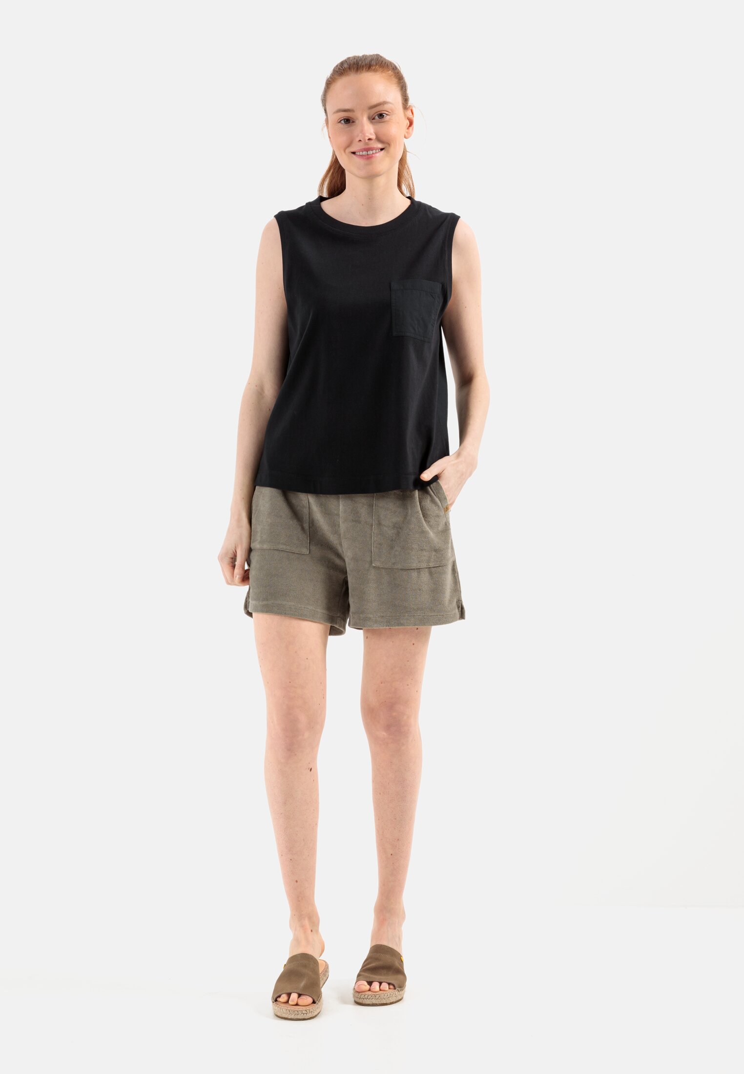 Women Sleeveless T-shirt with chest pocket Black worn front full body