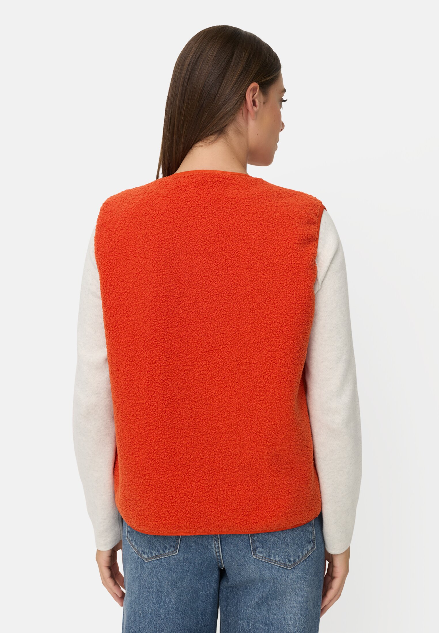 Vrouwen Teddyvest met zij-ingrepen pockets Oranje gedragen achter