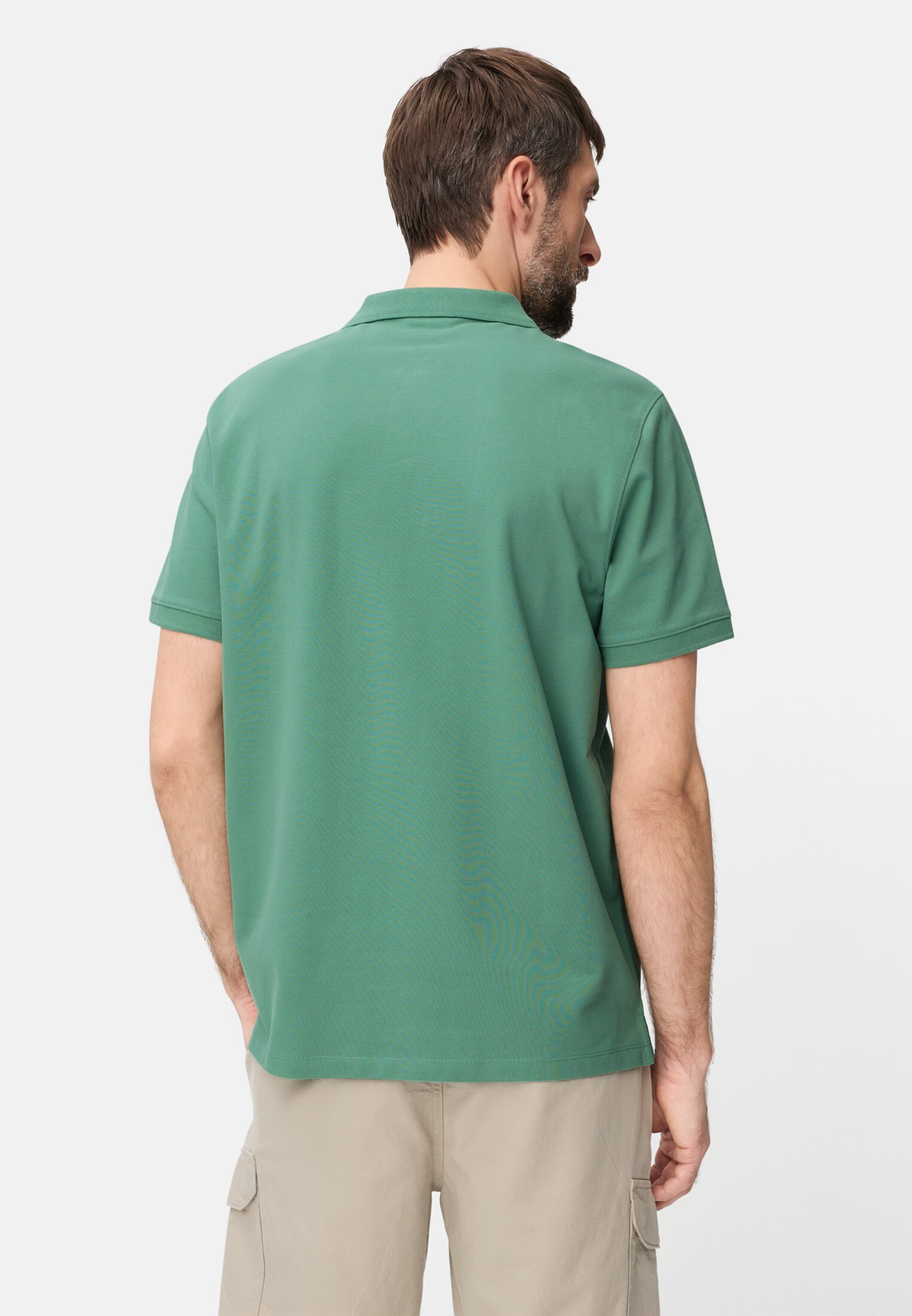 Heren Poloshirt met contrastdetails Lagunengroen gedragen achter