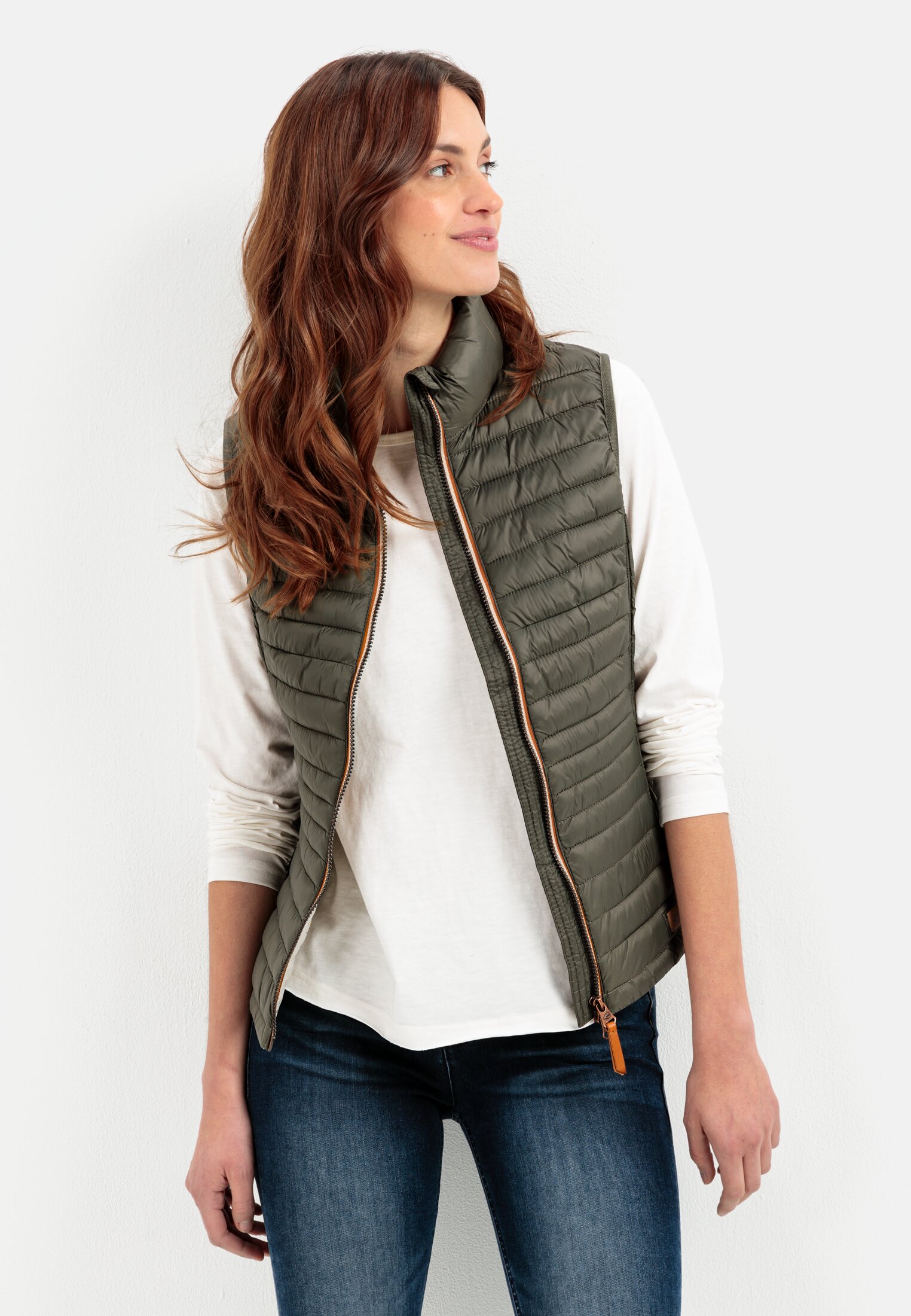 Women Quilted vest made from 100% recycled material Khaki worn emotional