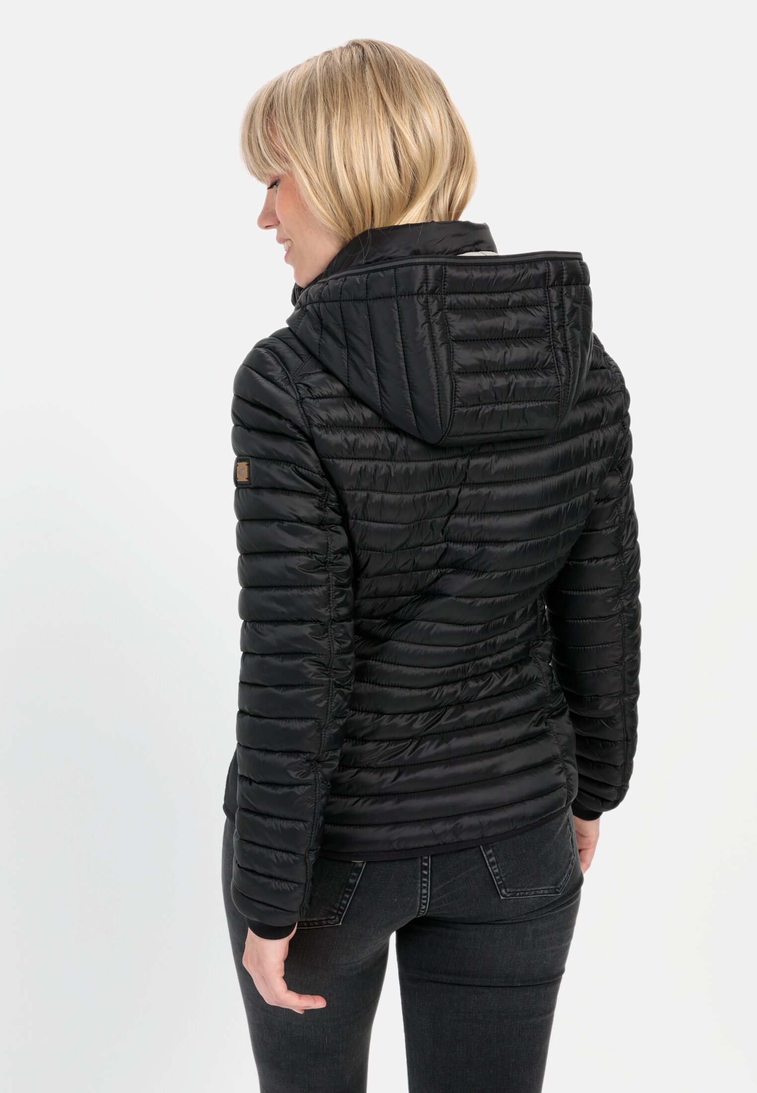 Women Lightweight quilted jacket made from recycled polyamide Black worn back