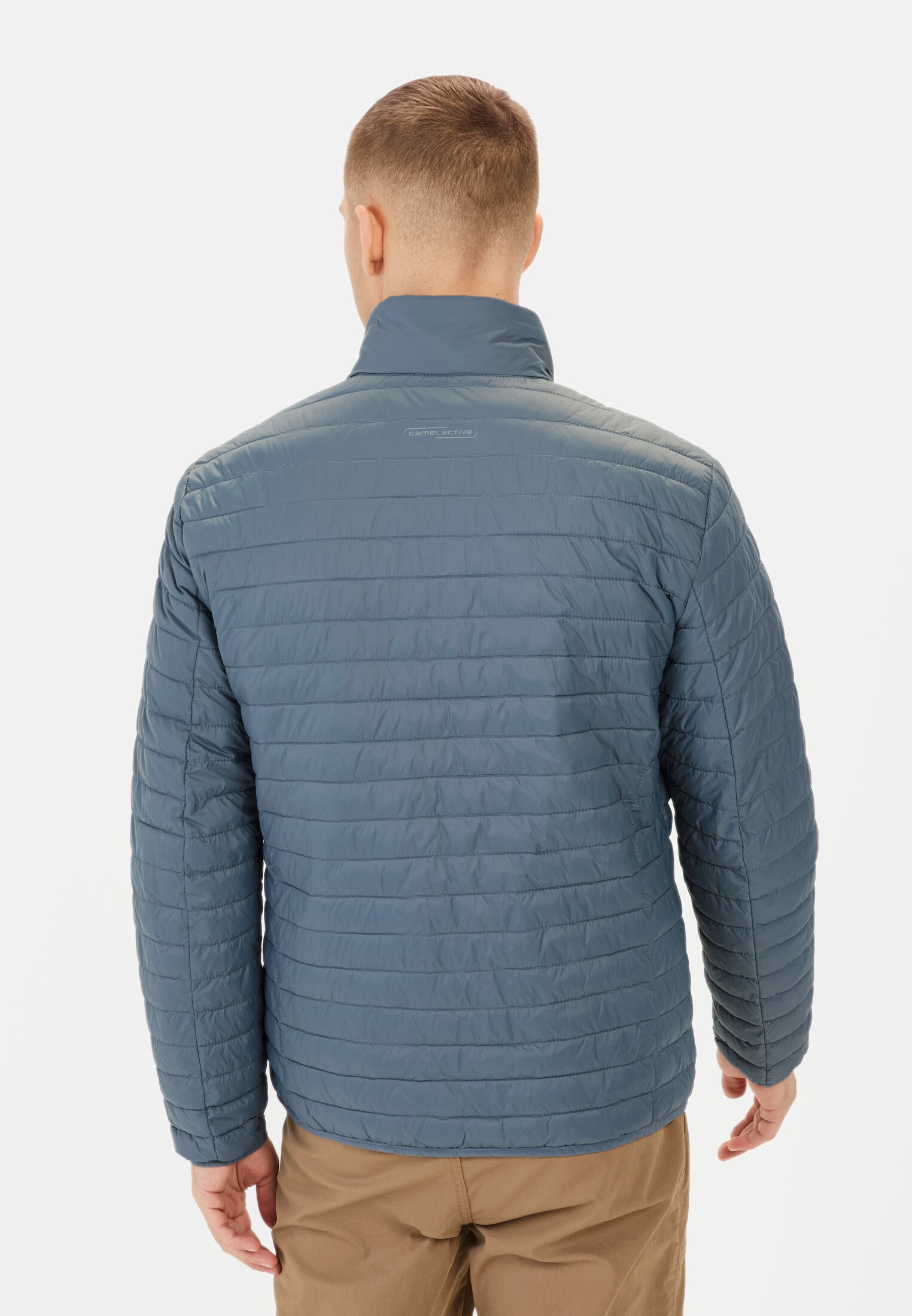 Heren Gewatteerde blouson met opstaande kraag Blauw gedragen achter