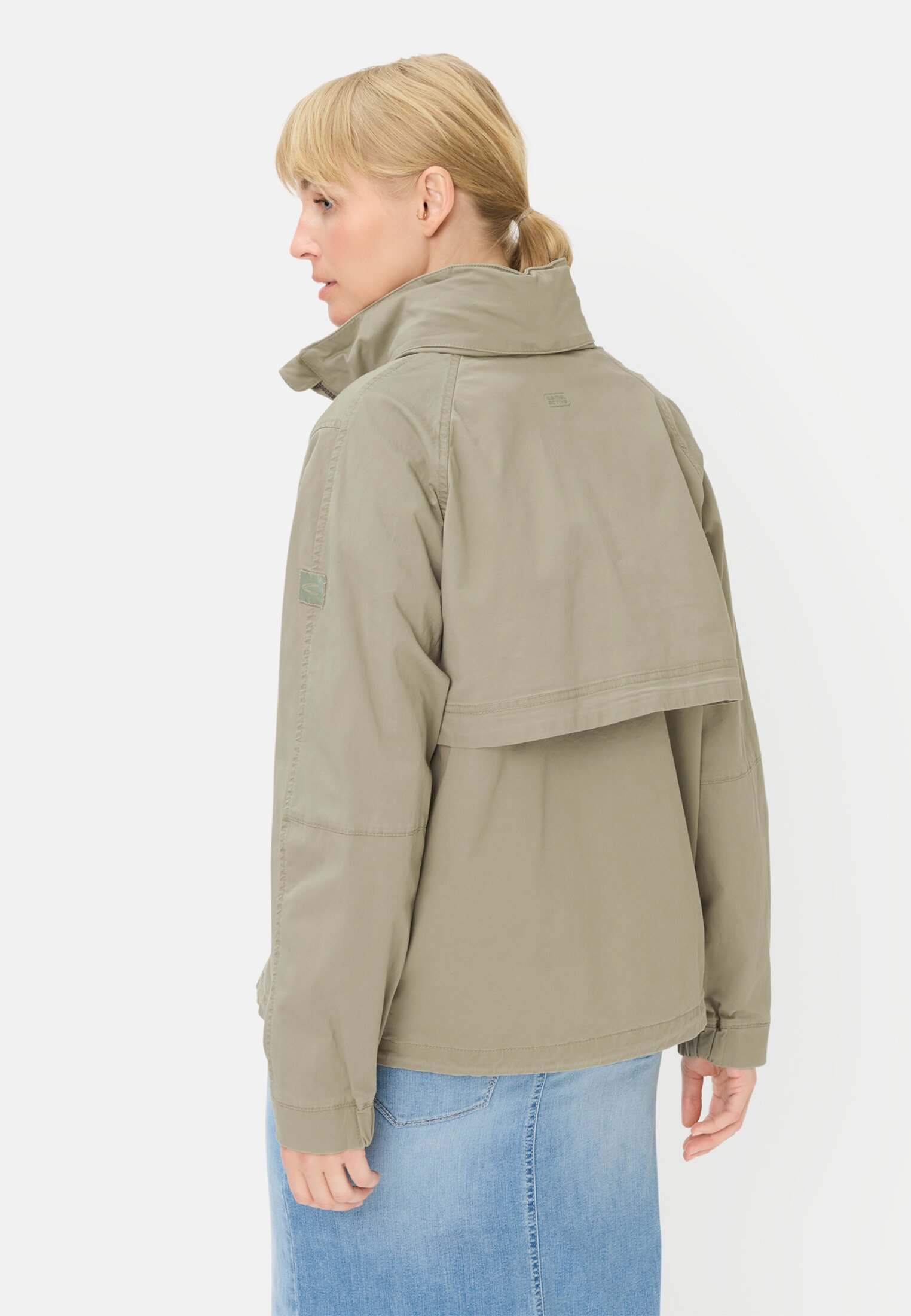 Women Blouson with a roll-out hood Sage worn back