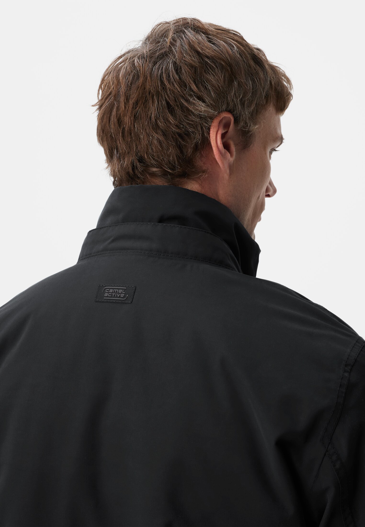 Men teXXXactive© functional jacket with removable hood Black worn detail close