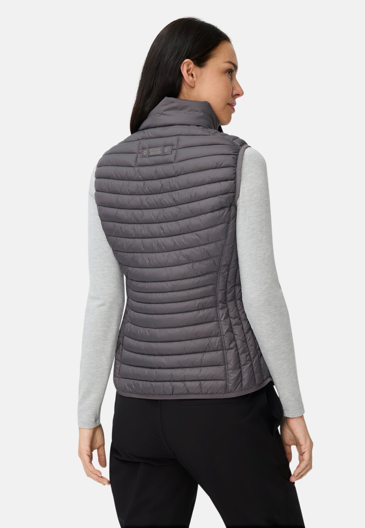 Women Quilted vest with reflective details Grey worn back