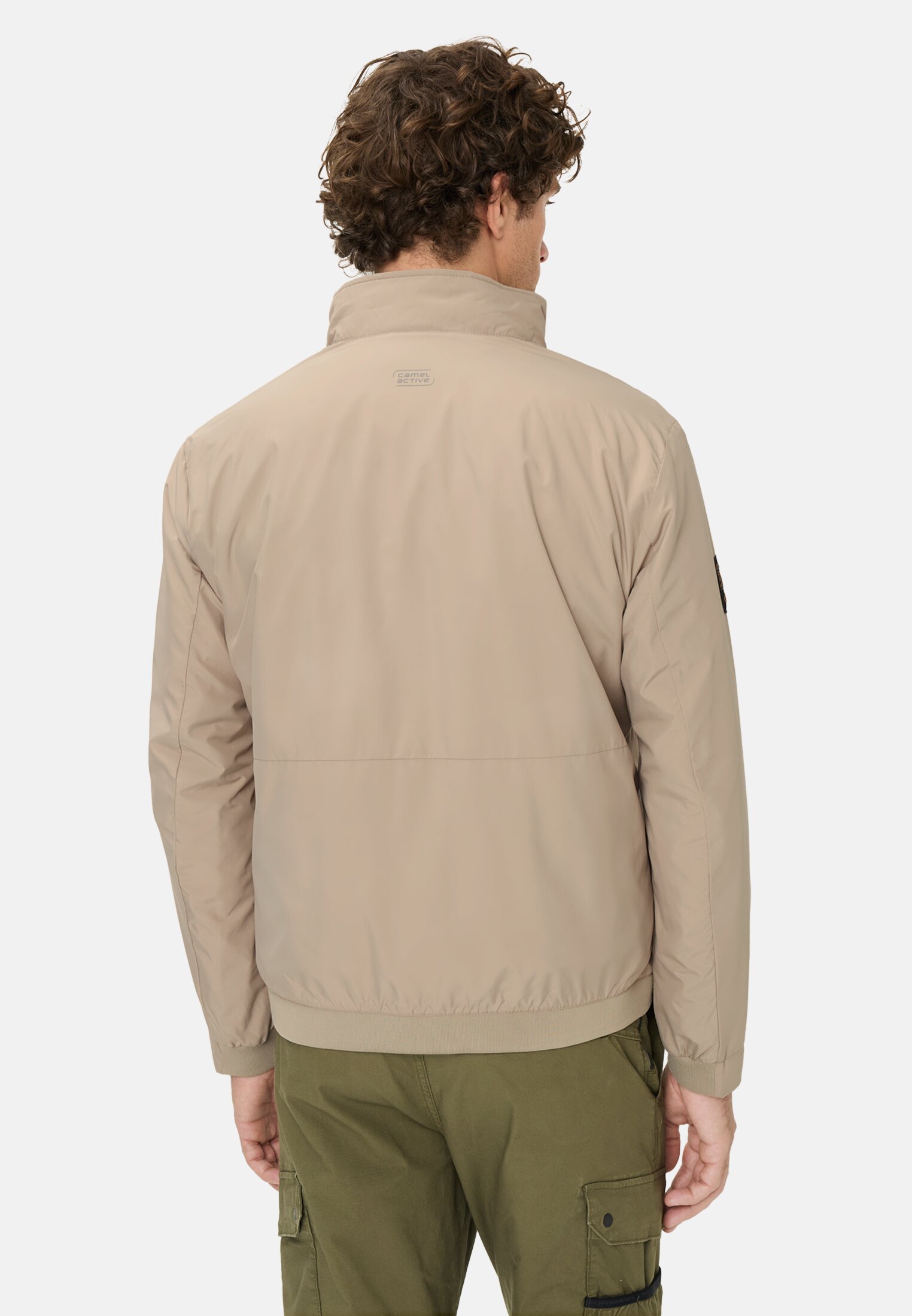 Heren Waterafstotende blouson met binnenvoering Beige gedragen achter