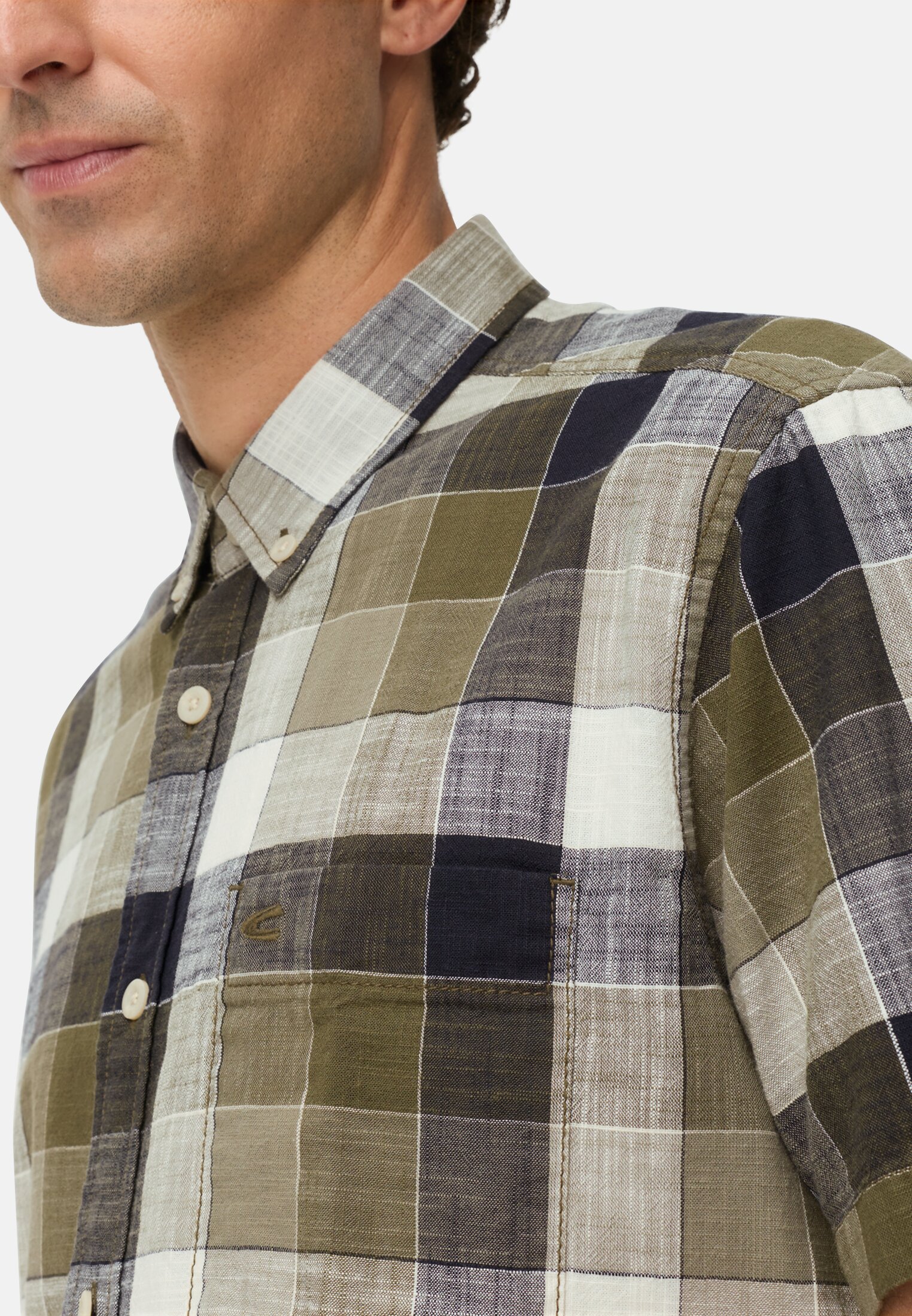 Men Checkered shirt made of pure cotton Olive Green worn detail close