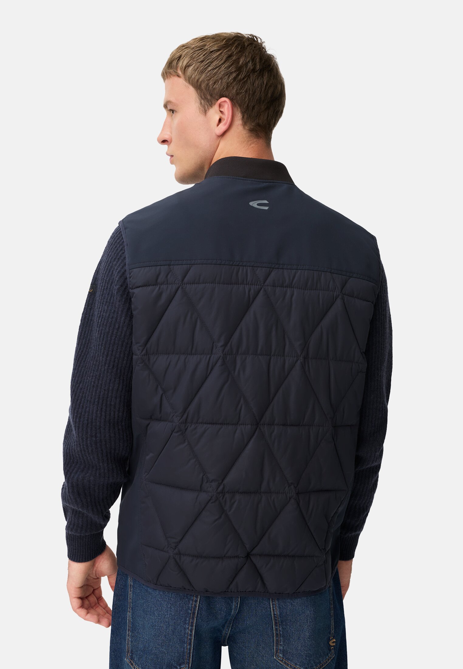 Men Lightweight vest made from water-repellent material Navy blue worn back