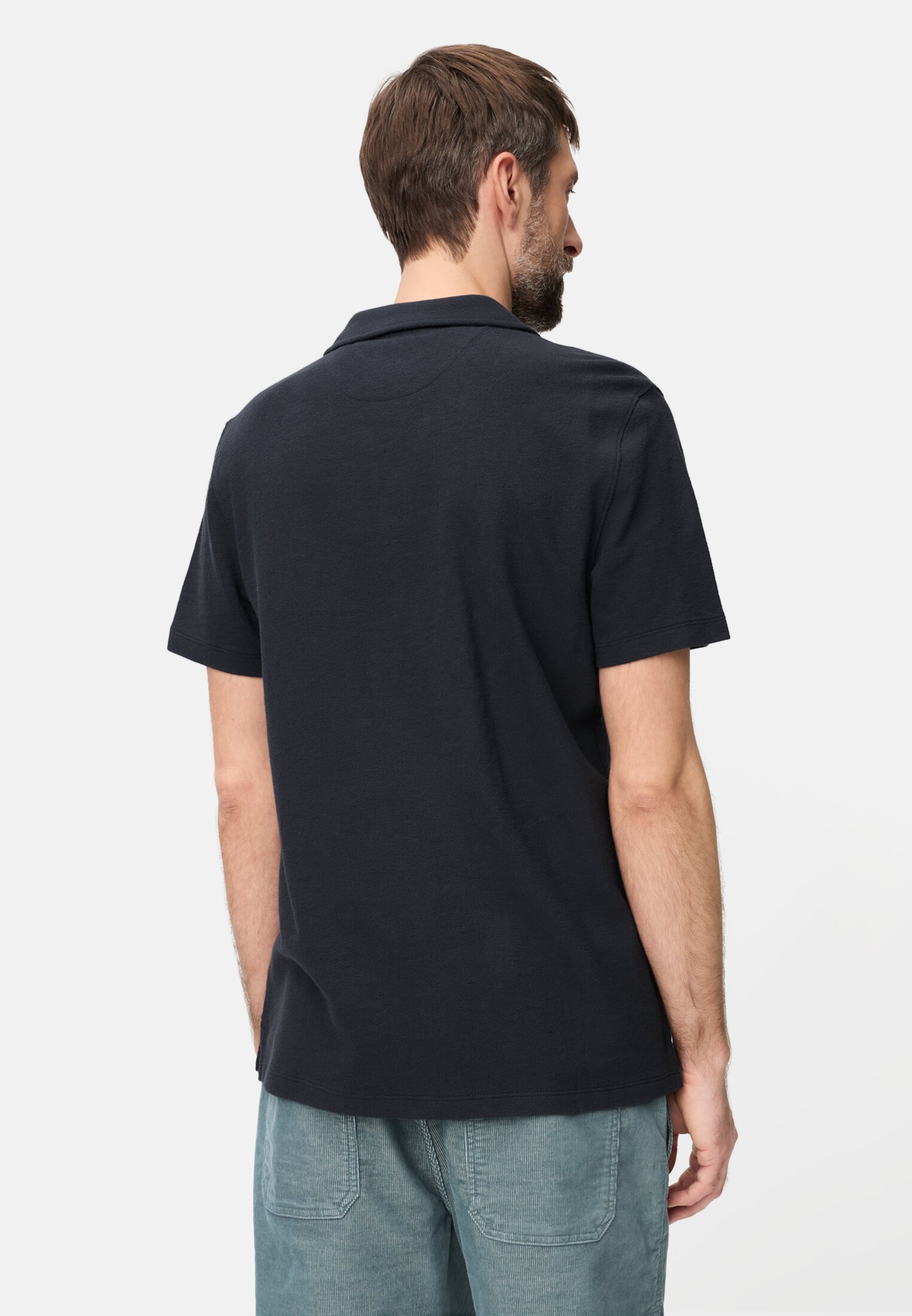 Men Polo shirt made of pure cotton Dark Blue worn back
