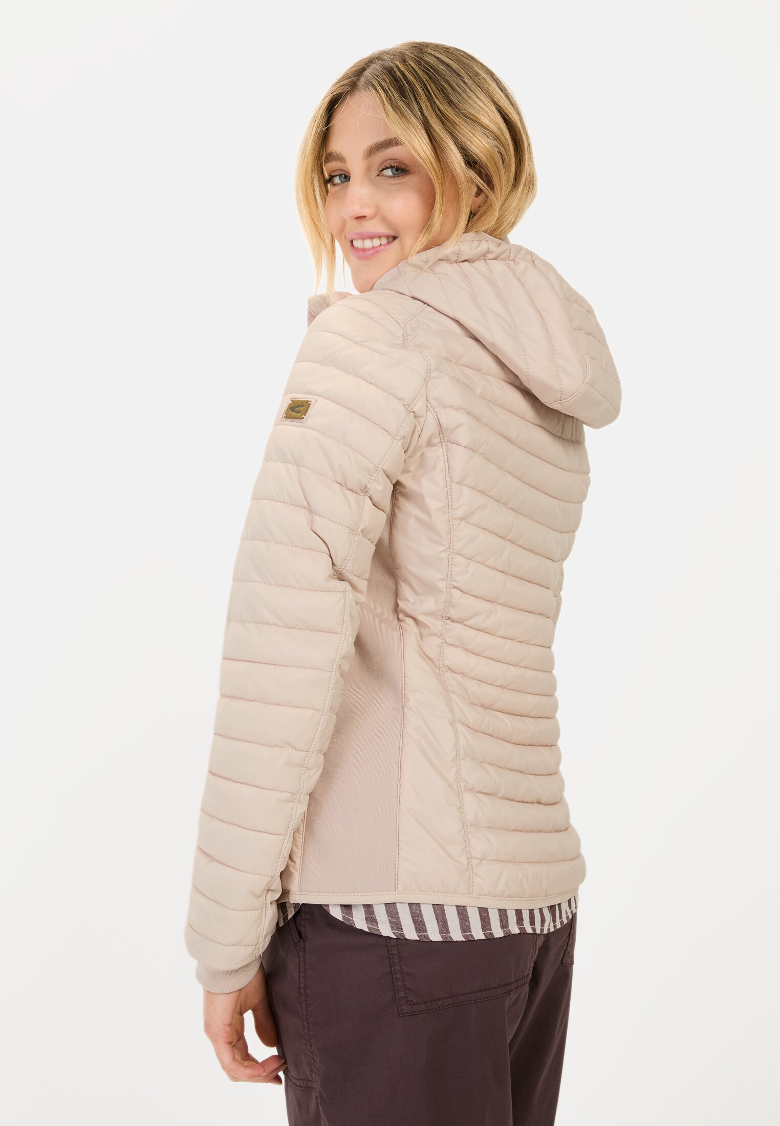 Women Lightweight quilted jacket made from recycled polyamide Rose worn emotional