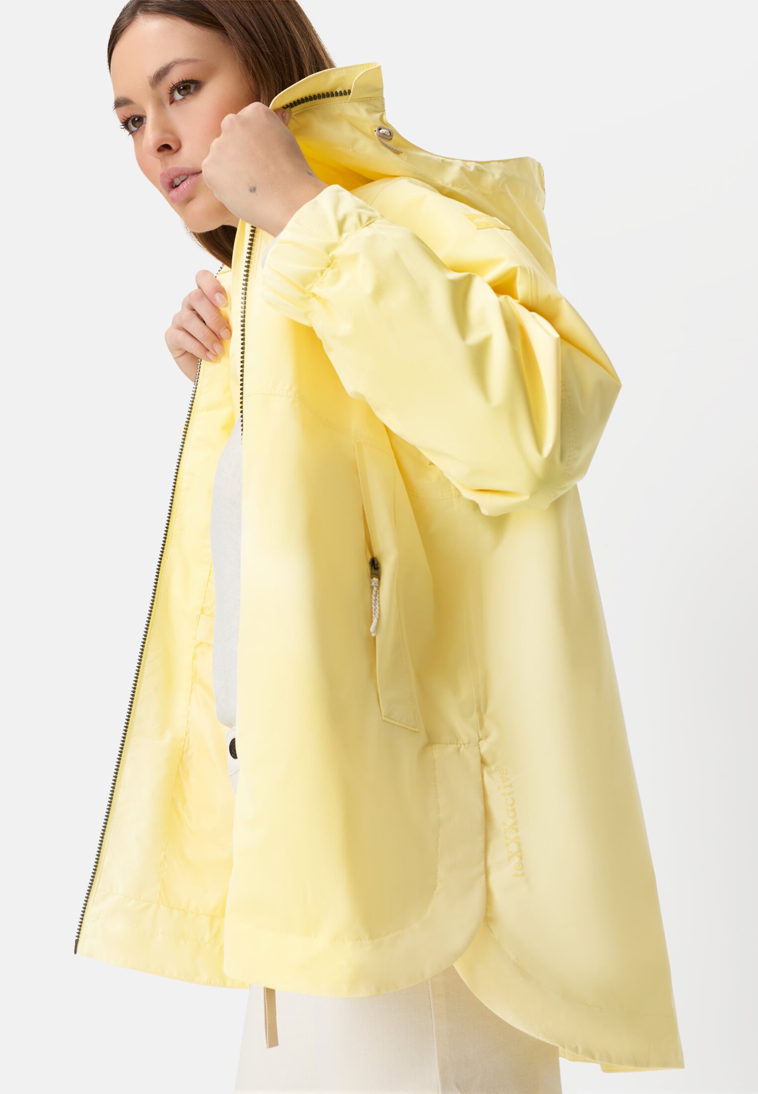 Women teXXXactive® Jacket with Adjustable Hood Lemon Yellow worn emotional