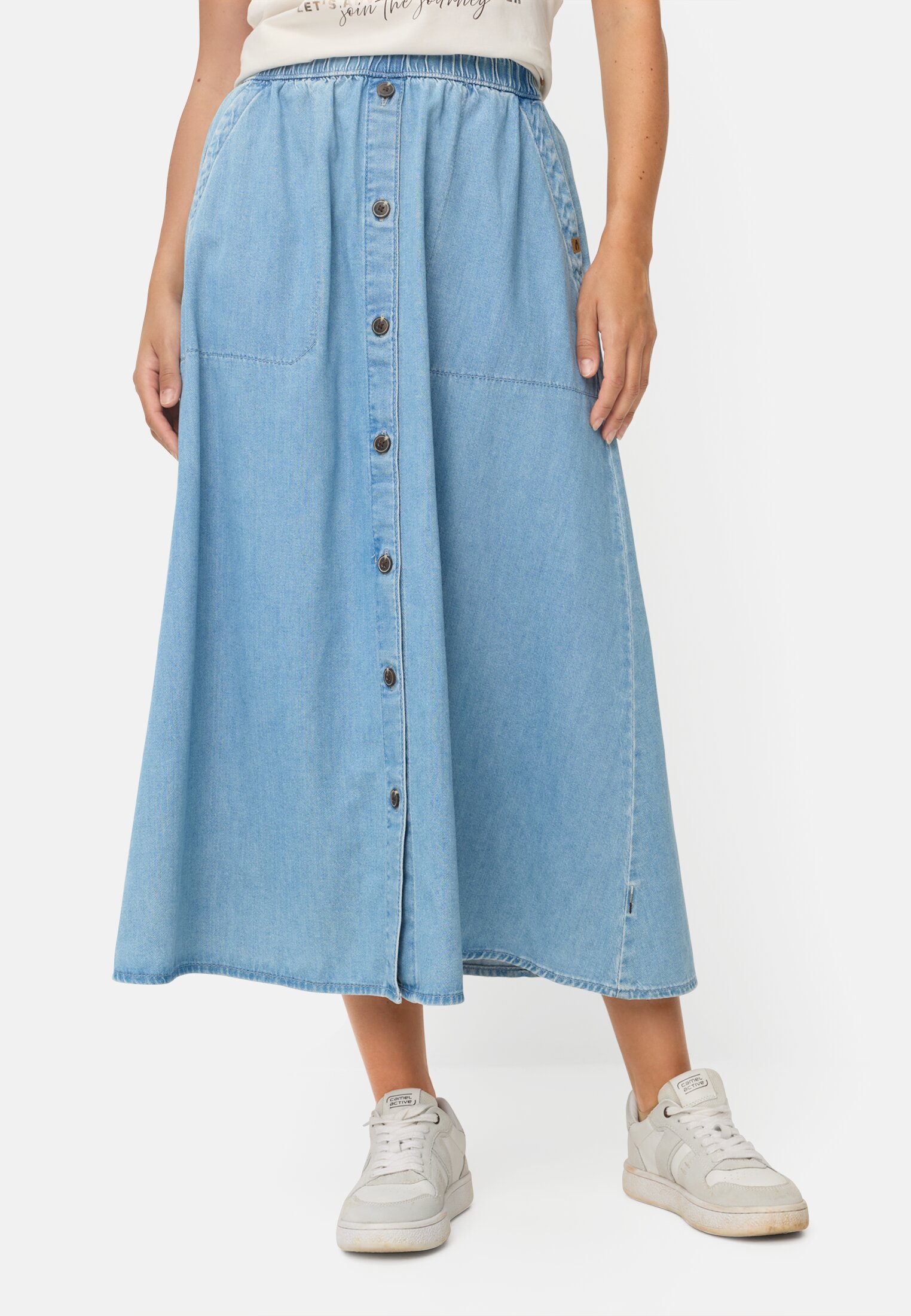 Women Denim skirt with a button placket Light Blue worn front
