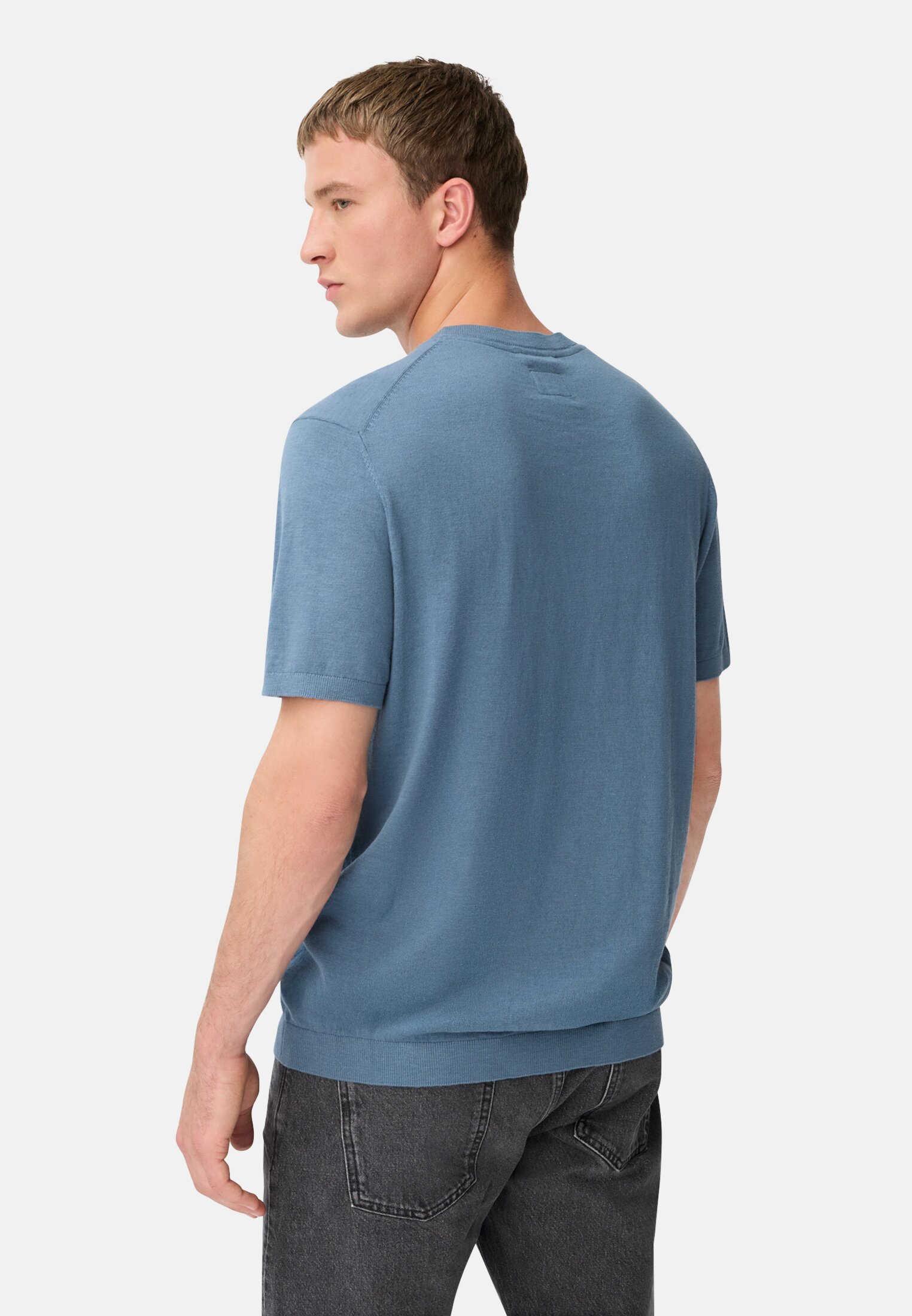 Men Knitted shirt made of pure cotton Stone blue worn back
