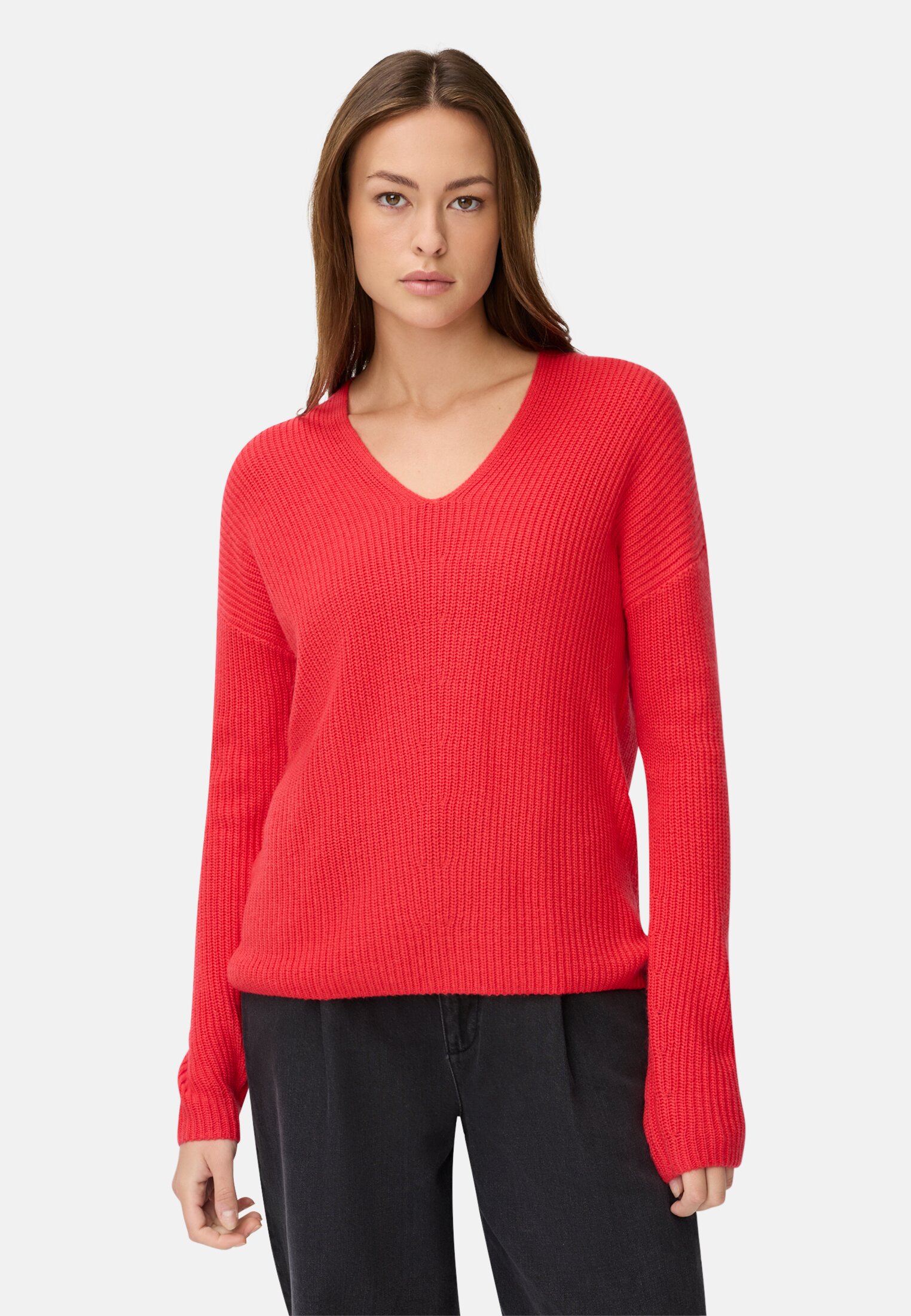 Women V-neck knitted sweater Flame red worn front