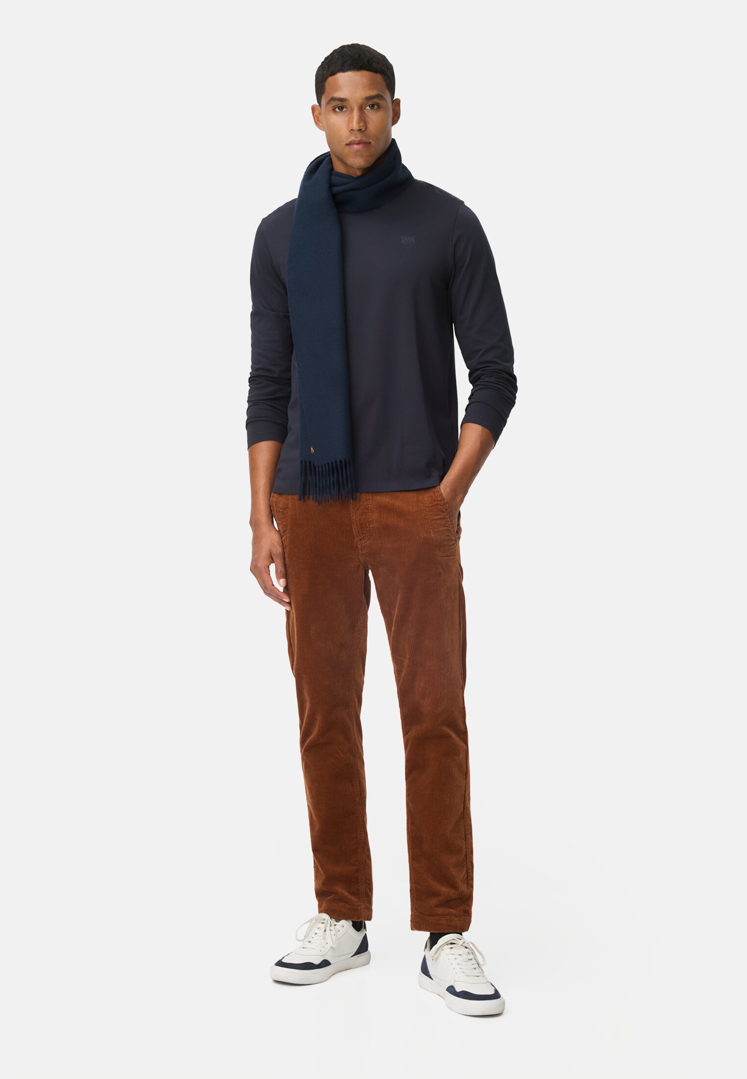 Men Regular fit corduroy chino trousers Cinnamon worn front full body