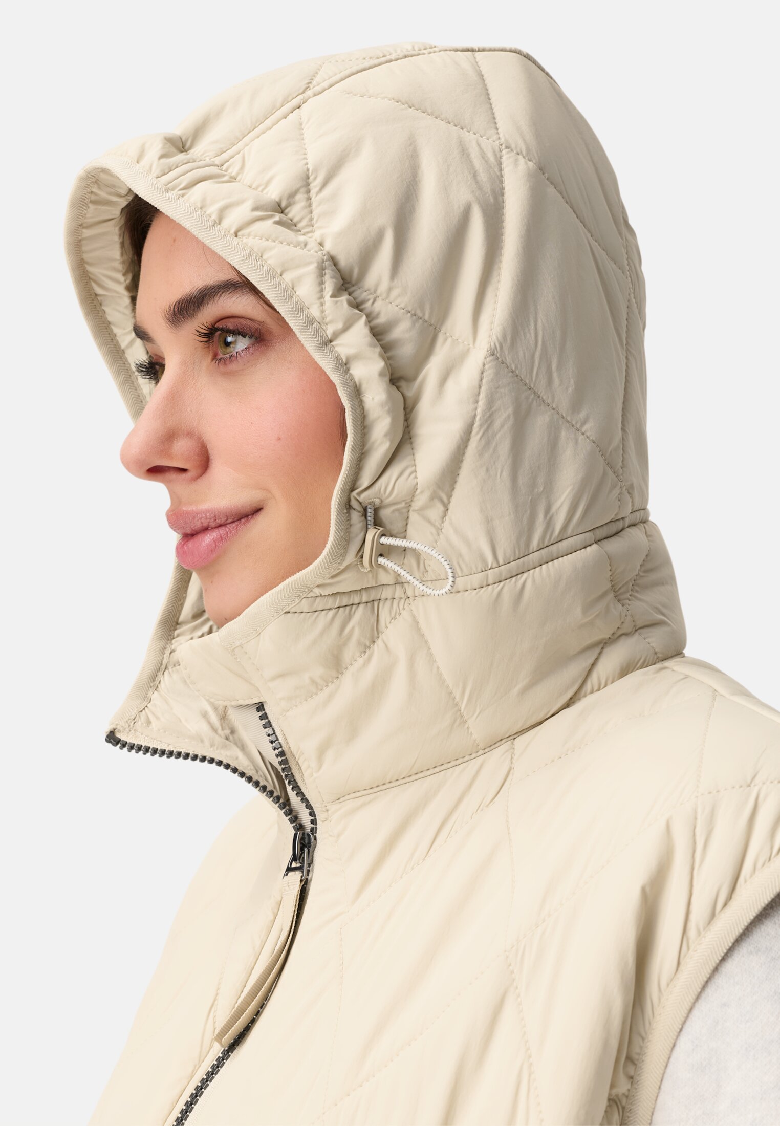 Damen Lange Weste mit Kapuze Eiche getragen detailliert nah