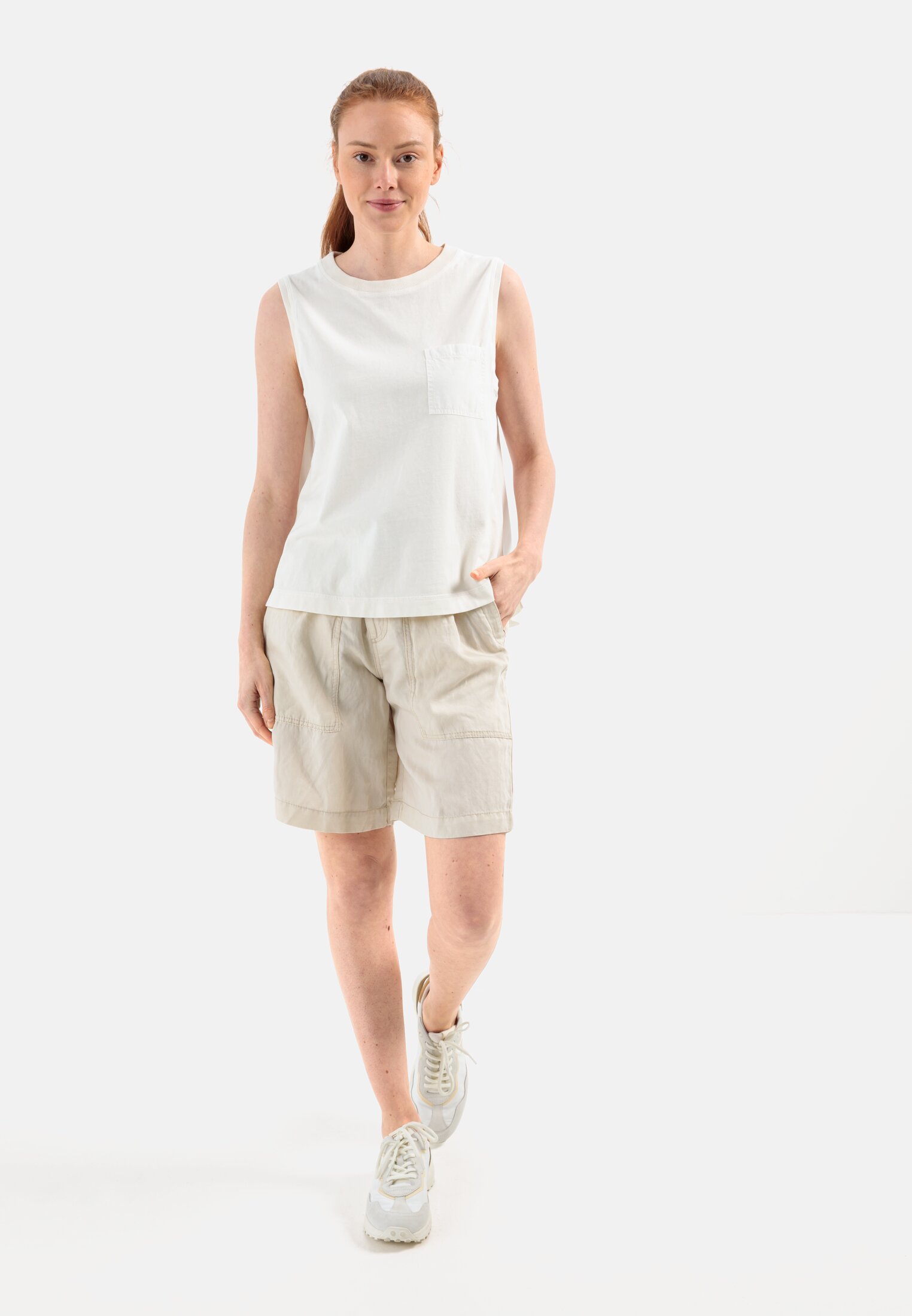 Women Sleeveless T-shirt with chest pocket White worn front full body