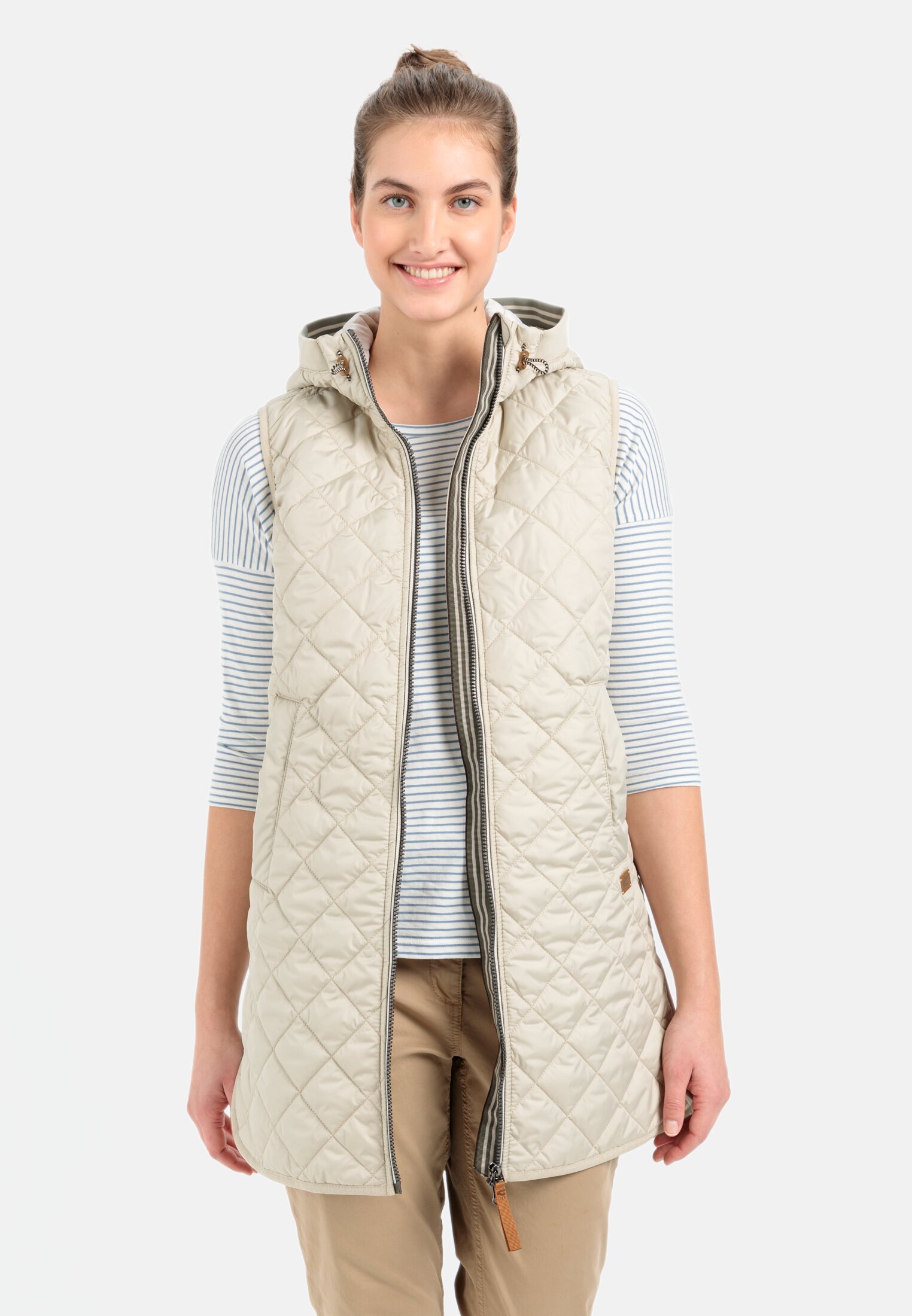 Women Long quilted vest made from recycled polyester Light Sage worn front