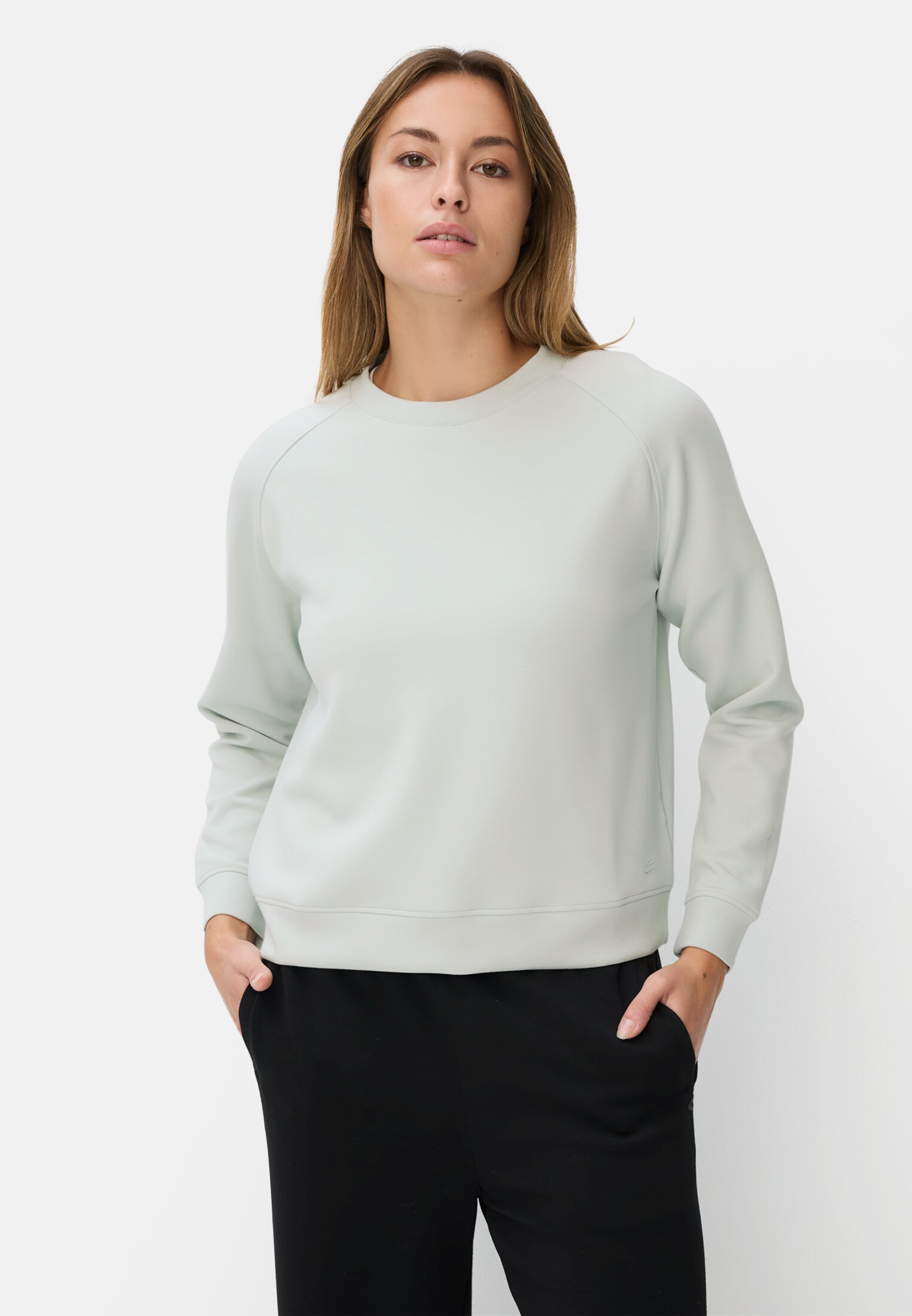 Damen Sweatshirt mit Raglanärmeln Minze getragen vorn