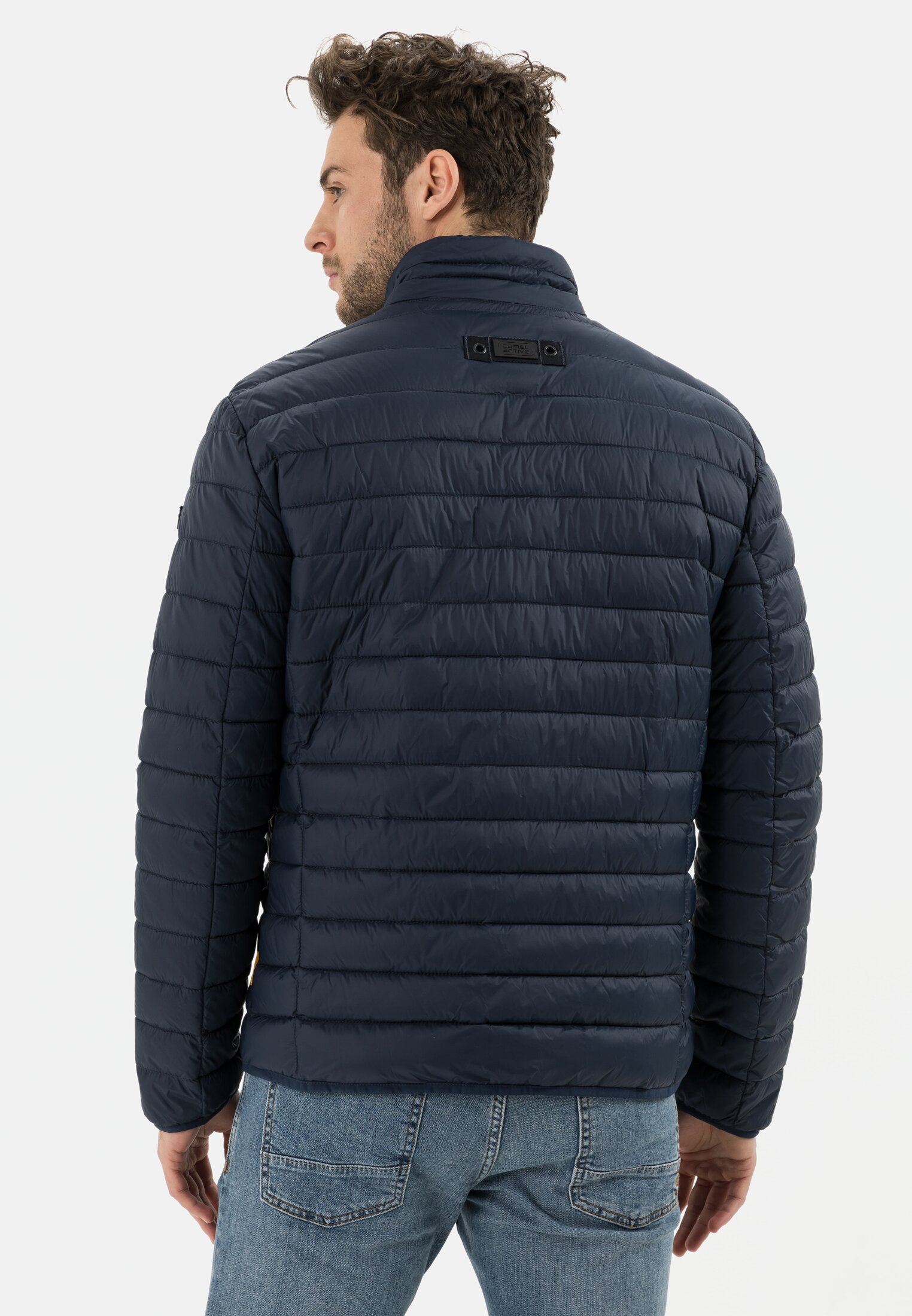 Men Downfree quilted jacket from recycled polyester Dark Blue worn back