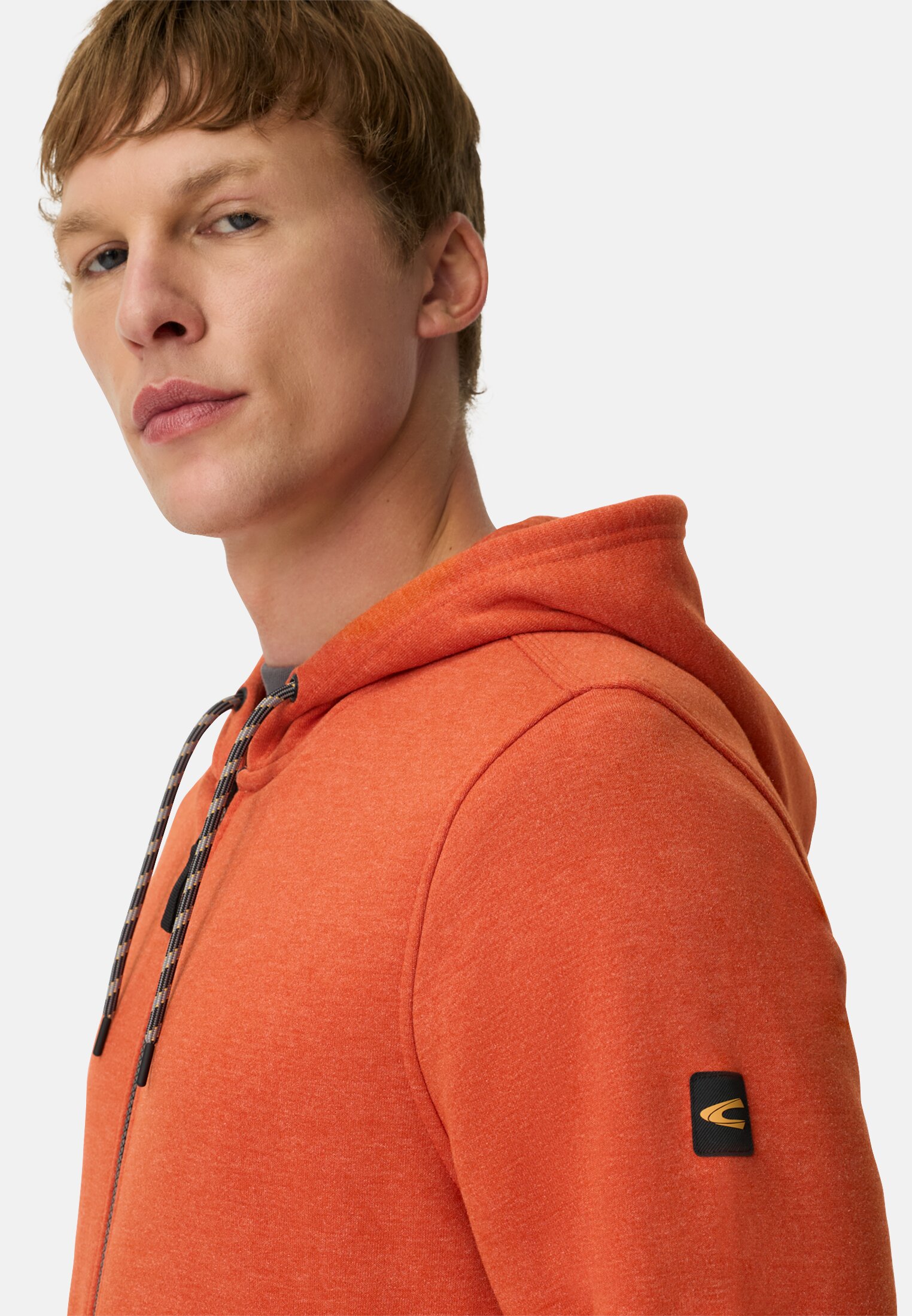 Herren Kapuzenjacke mit verstellbarem Kordelzug Orange getragen detailliert nah