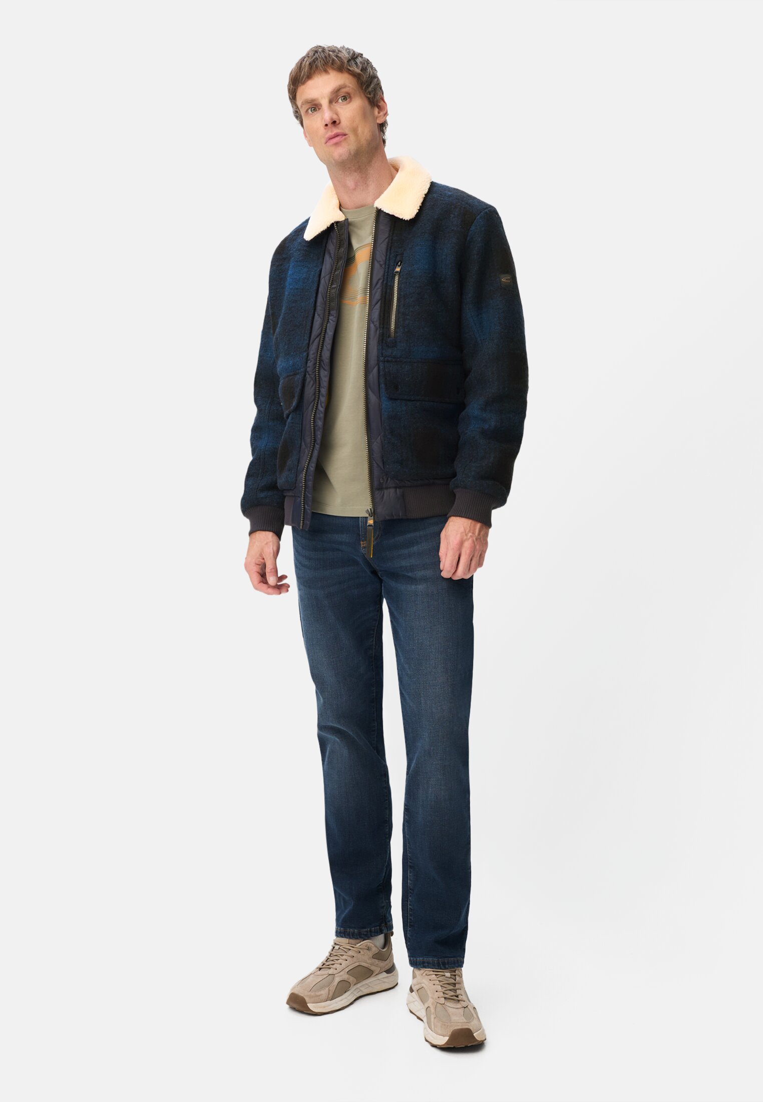 Men Bomber jacket with quilted pattern on the back tinted blue worn front full body